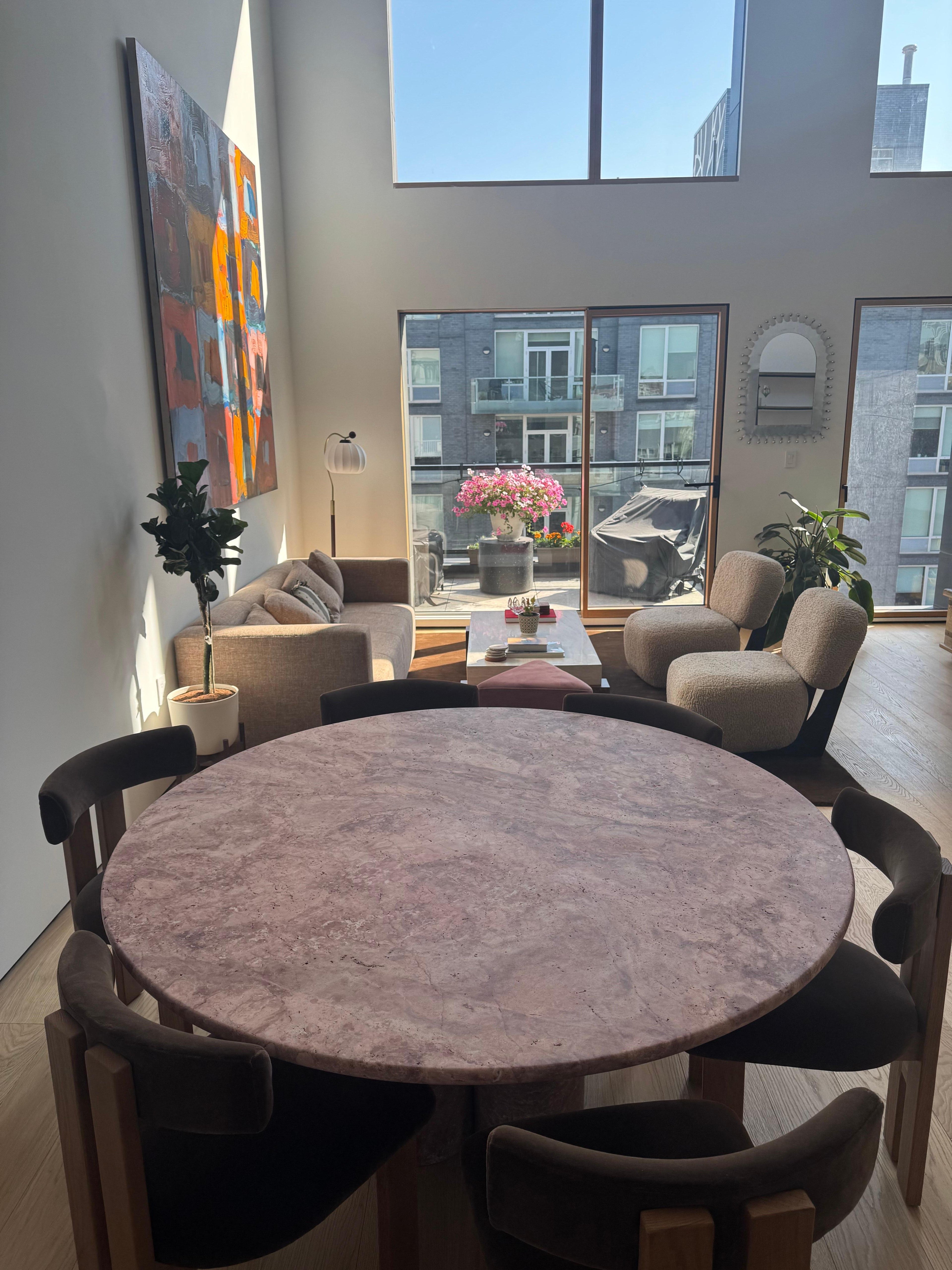 https://a.1stdibscdn.com/round-red-travertine-dining-table-with-column-legs-in-style-of-mario-bellini-for-sale-picture-7/f_80522/f_40992812/IMG_1748992417734_master.jpeg