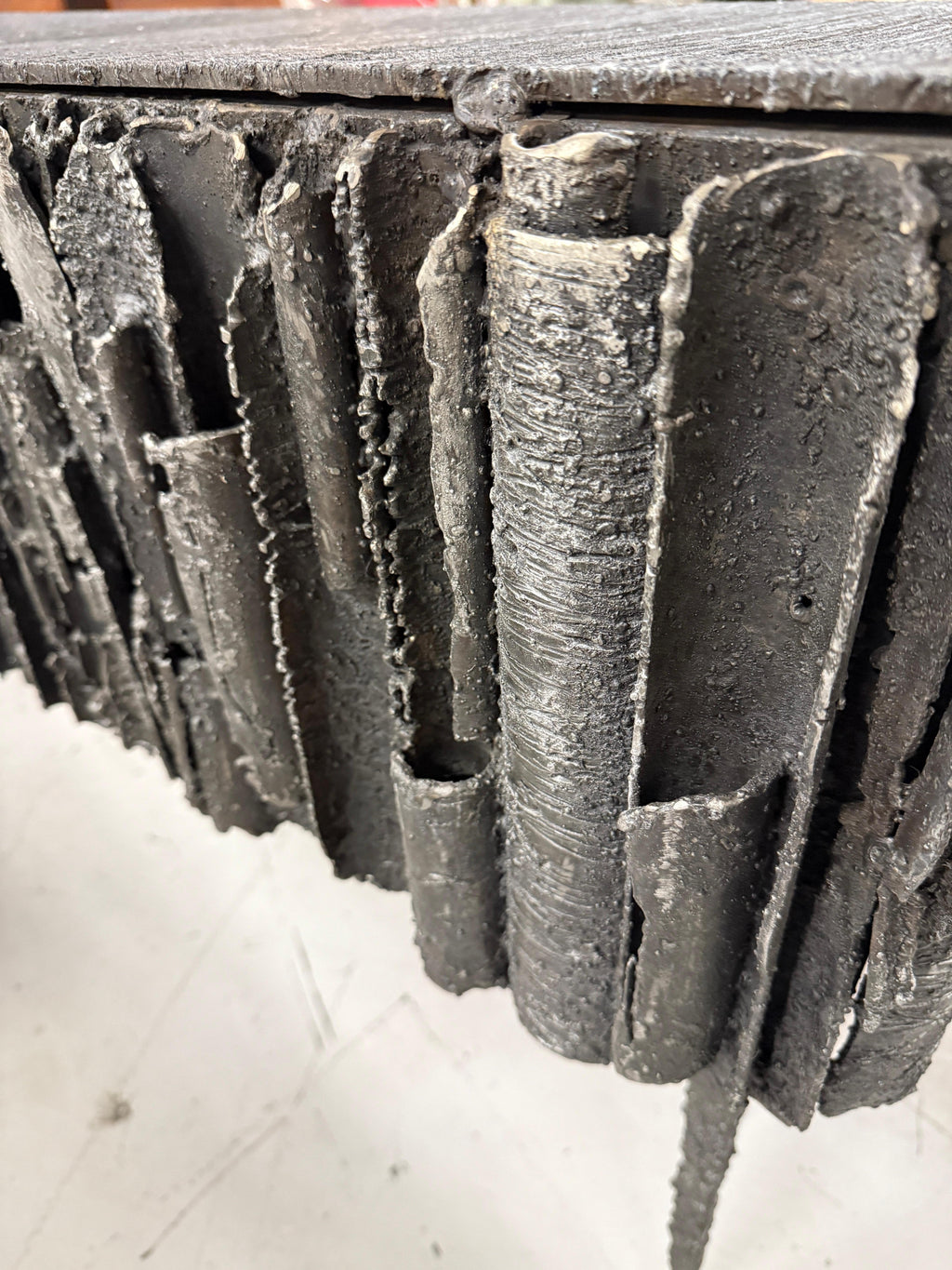 https://a.1stdibscdn.com/2021-james-bearden-brutalist-corinthian-cabinet-in-plasma-carved-steel-for-sale-picture-9/f_8350/f_46472972/IMG_1756588871808_master.jpeg
