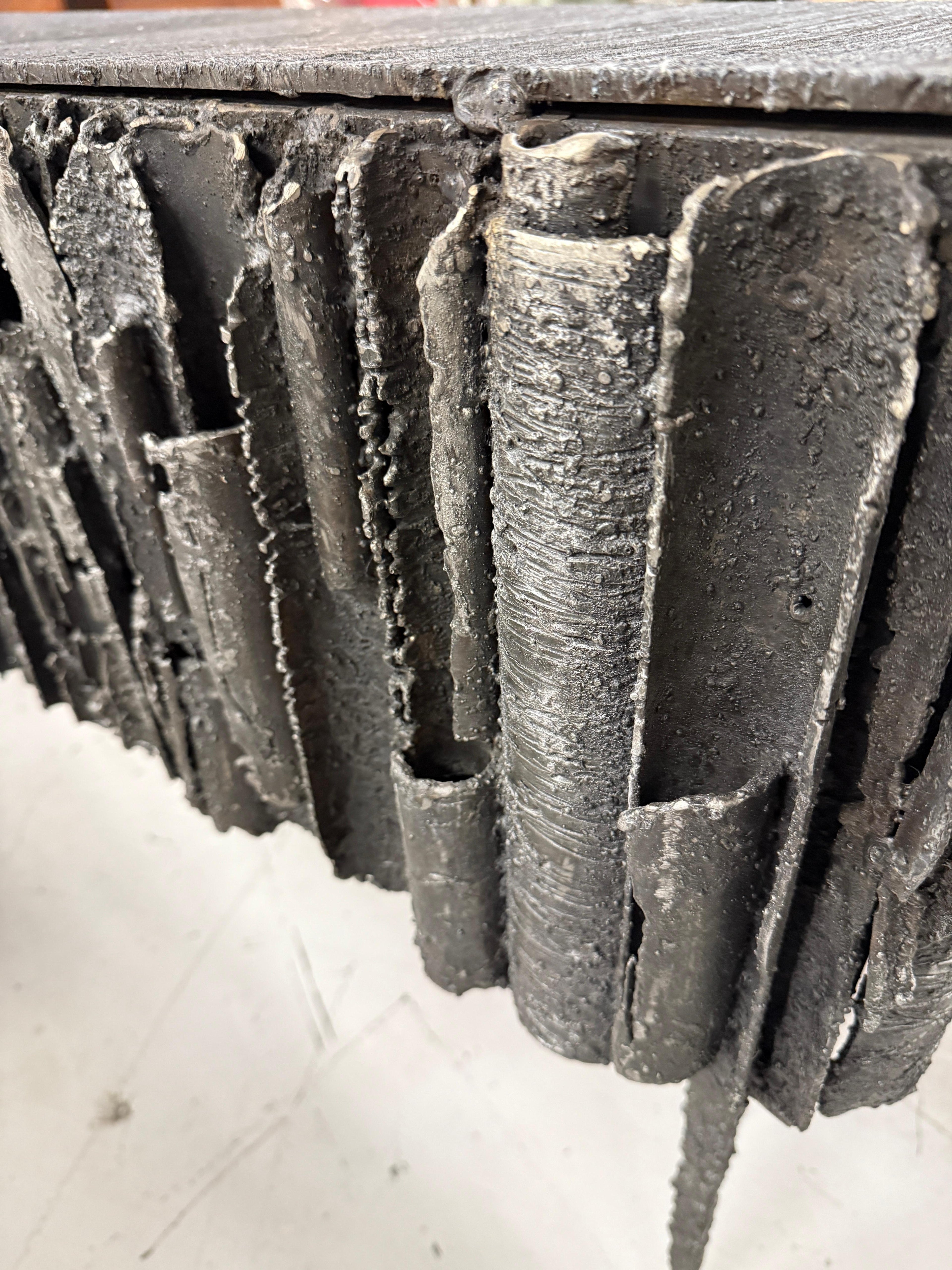https://a.1stdibscdn.com/2021-james-bearden-brutalist-corinthian-cabinet-in-plasma-carved-steel-for-sale-picture-9/f_8350/f_46472972/IMG_1756588871808_master.jpeg