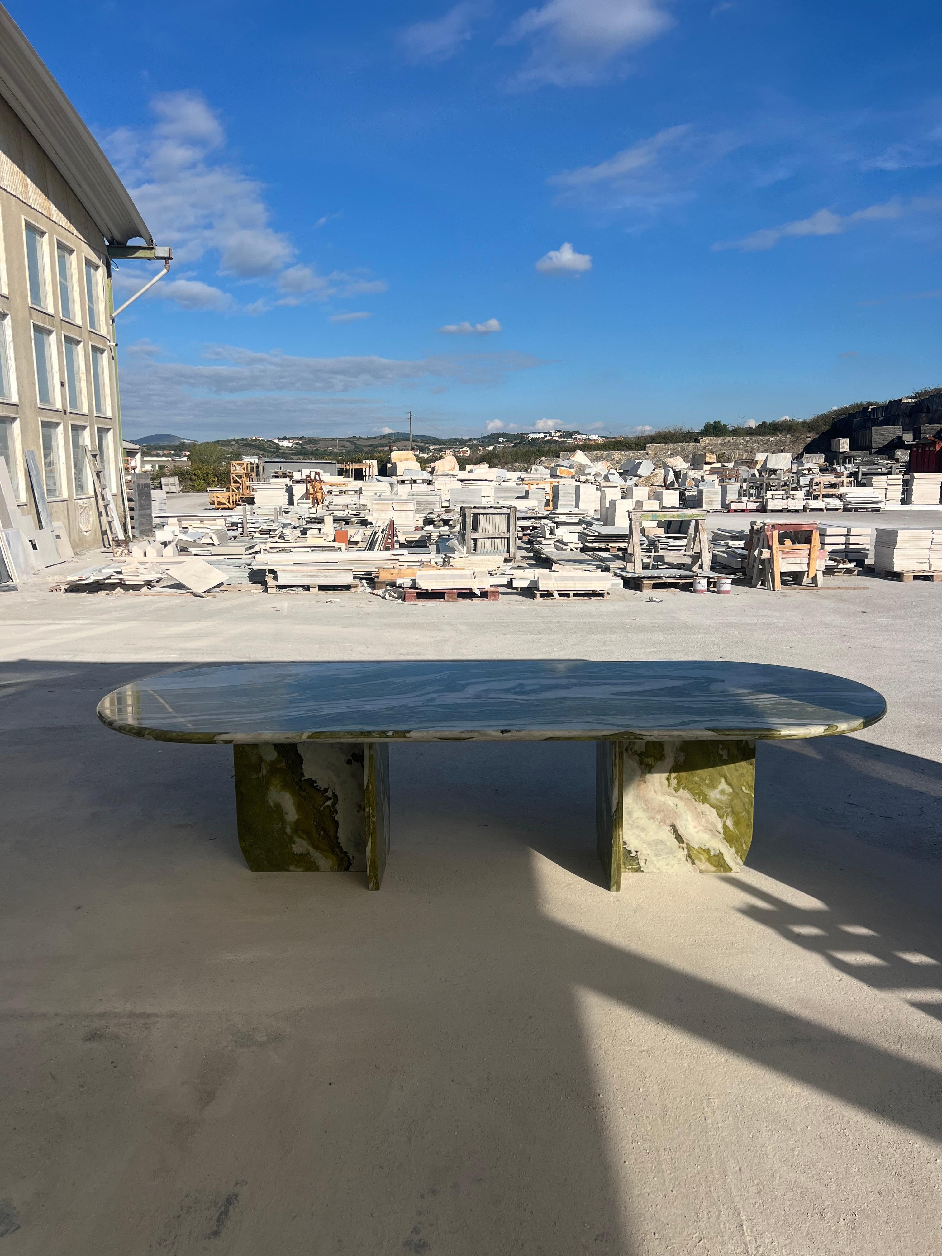 https://a.1stdibscdn.com/large-green-marble-oval-dining-table-by-my-habitat-design-for-sale-picture-2/f_80522/f_47585542/IMG_1763476195419_master.JPG