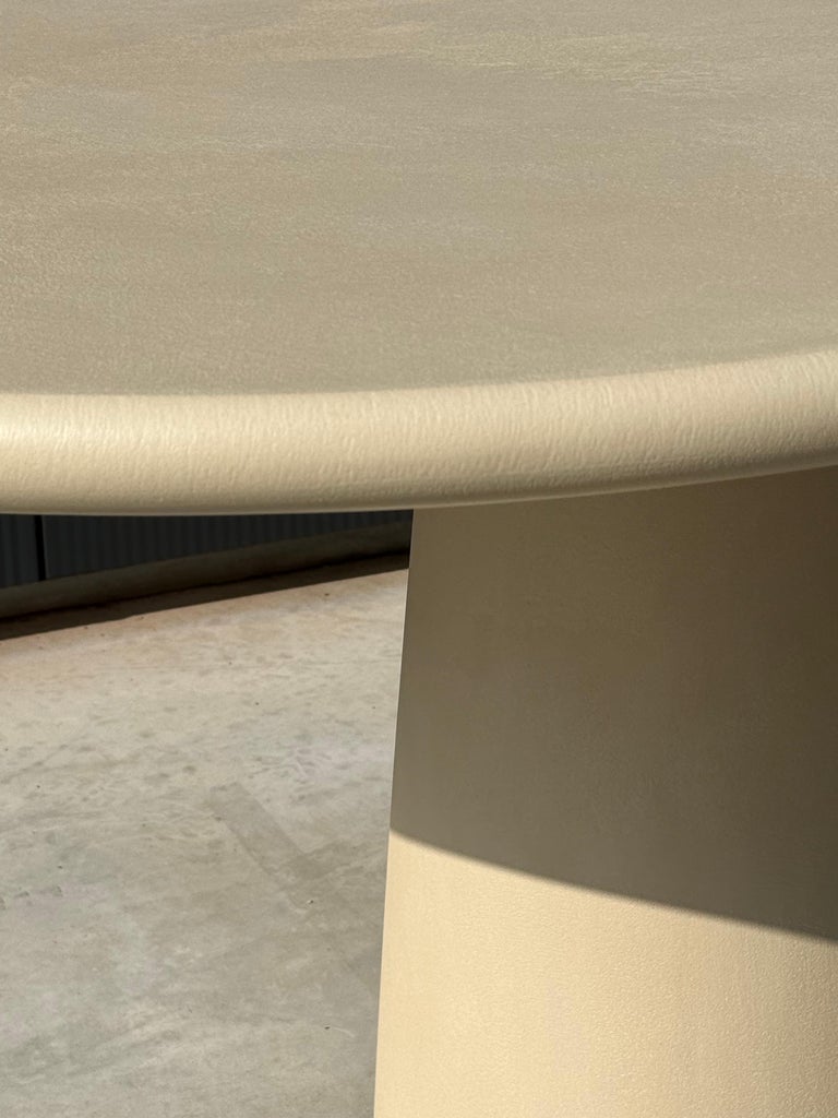 https://a.1stdibscdn.com/handcrafted-w-plaster-textured-dining-table-menhir-flat-oval-320-for-sale-picture-13/f_86552/f_44289362/IMG_1774171854093_master.jpeg?width=768