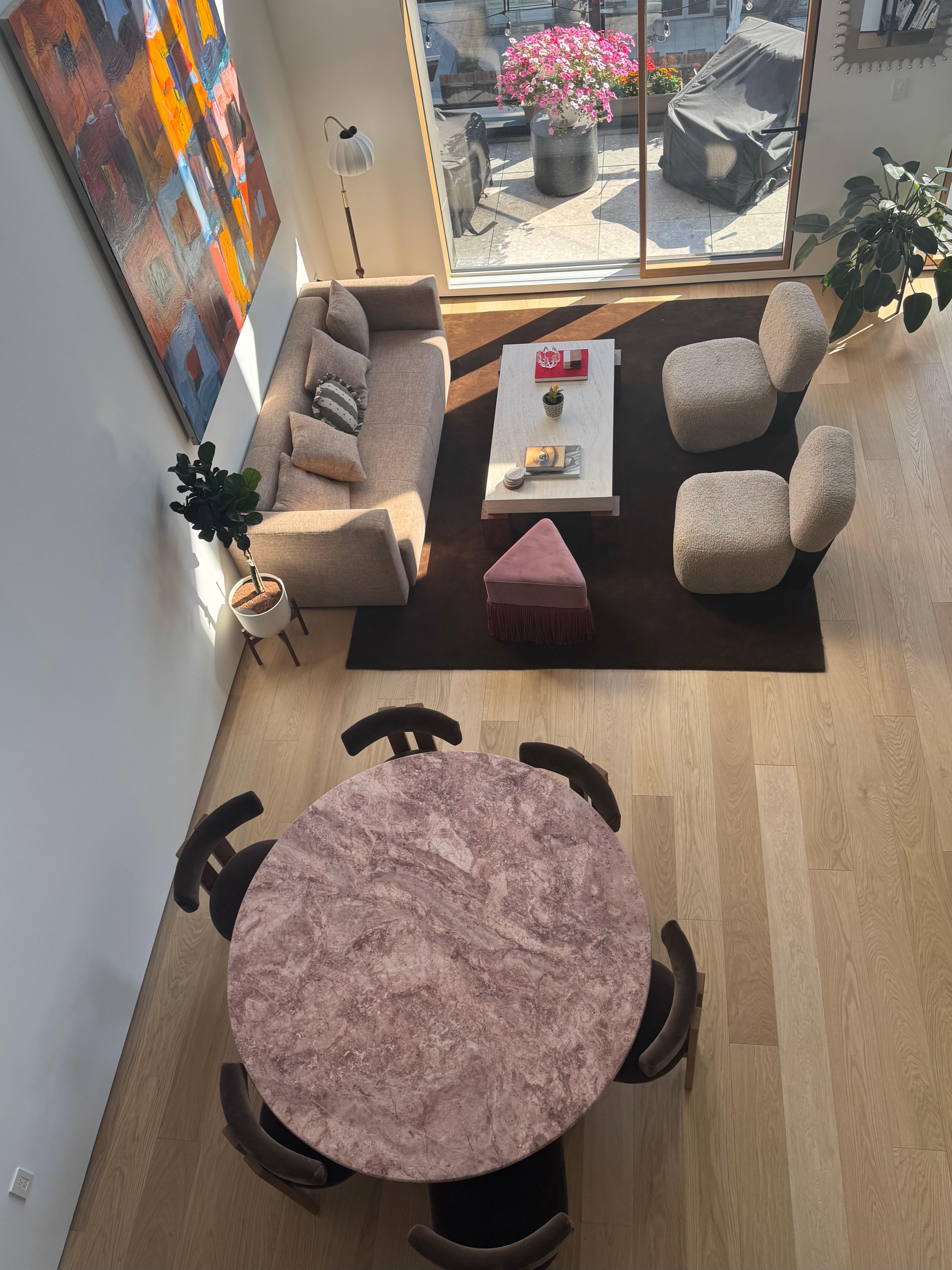 https://a.1stdibscdn.com/round-red-travertine-dining-table-with-column-legs-in-style-of-mario-bellini-for-sale-picture-5/f_80522/f_409928121748992372621/IMG_1883_master.jpeg
