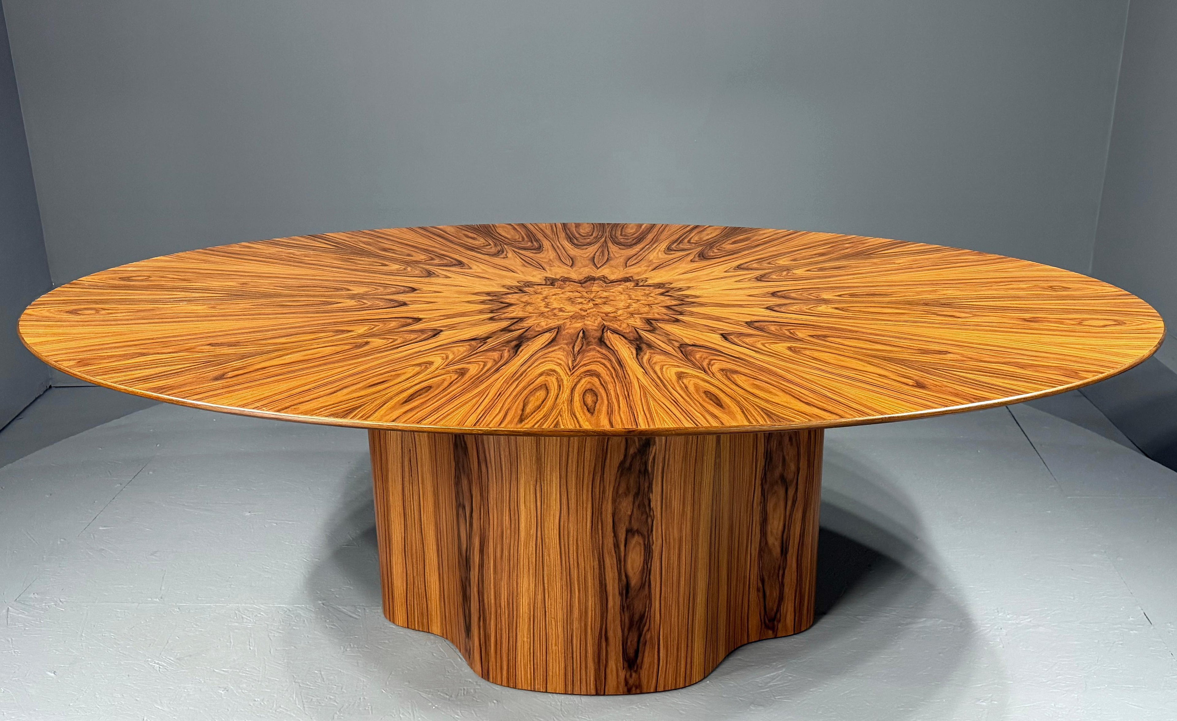 https://a.1stdibscdn.com/84-inch-unique-rosewood-oval-dining-table-by-aaron-saxton-for-sale-picture-6/f_16162/f_484793021769216762359/IMG_2003_master.jpeg