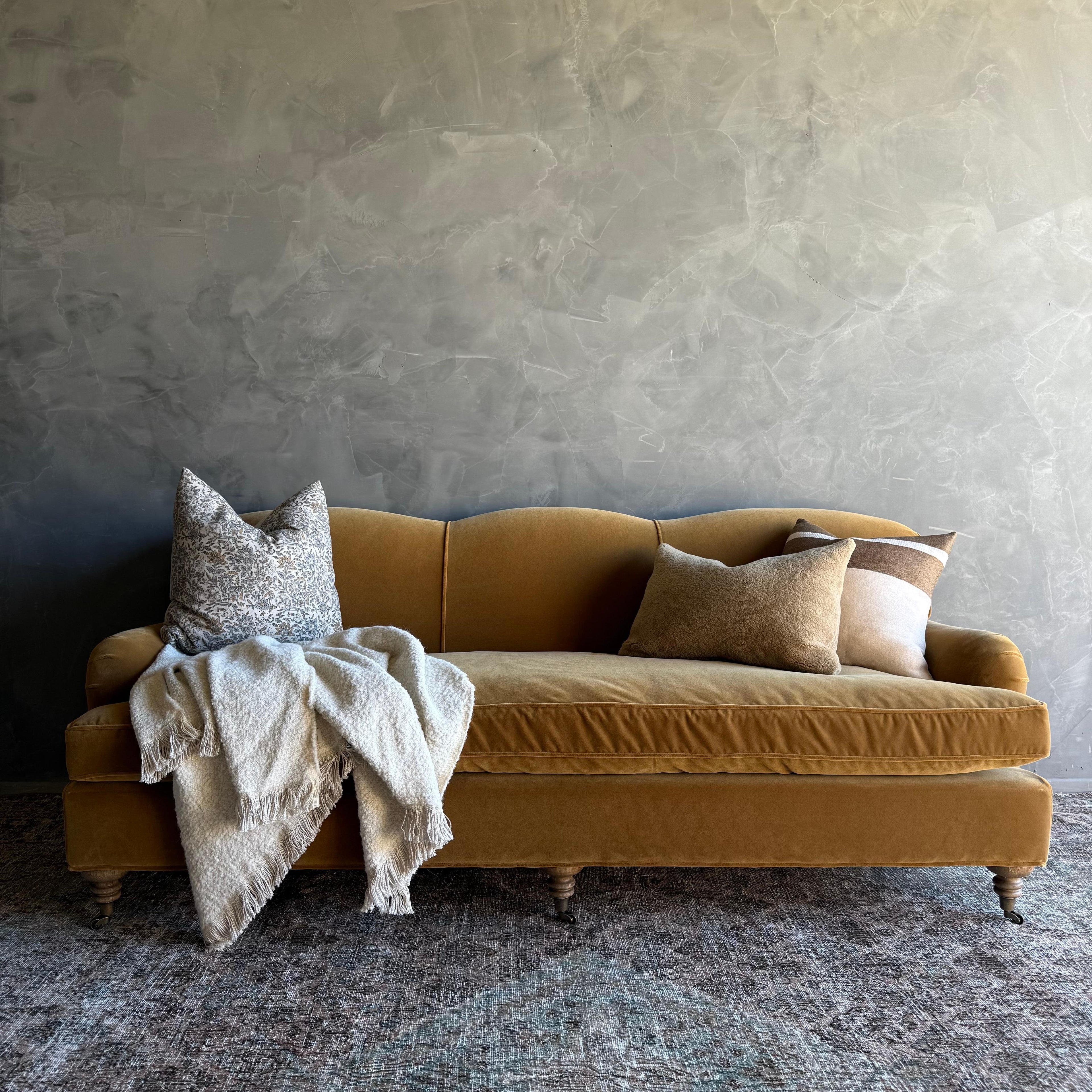 https://a.1stdibscdn.com/modern-english-sofa-in-a-caramel-mustard-faux-velvet-mohair-with-down-cushion-for-sale-picture-3/f_18223/f_478269521764806001024/IMG_2050_2_master.jpg