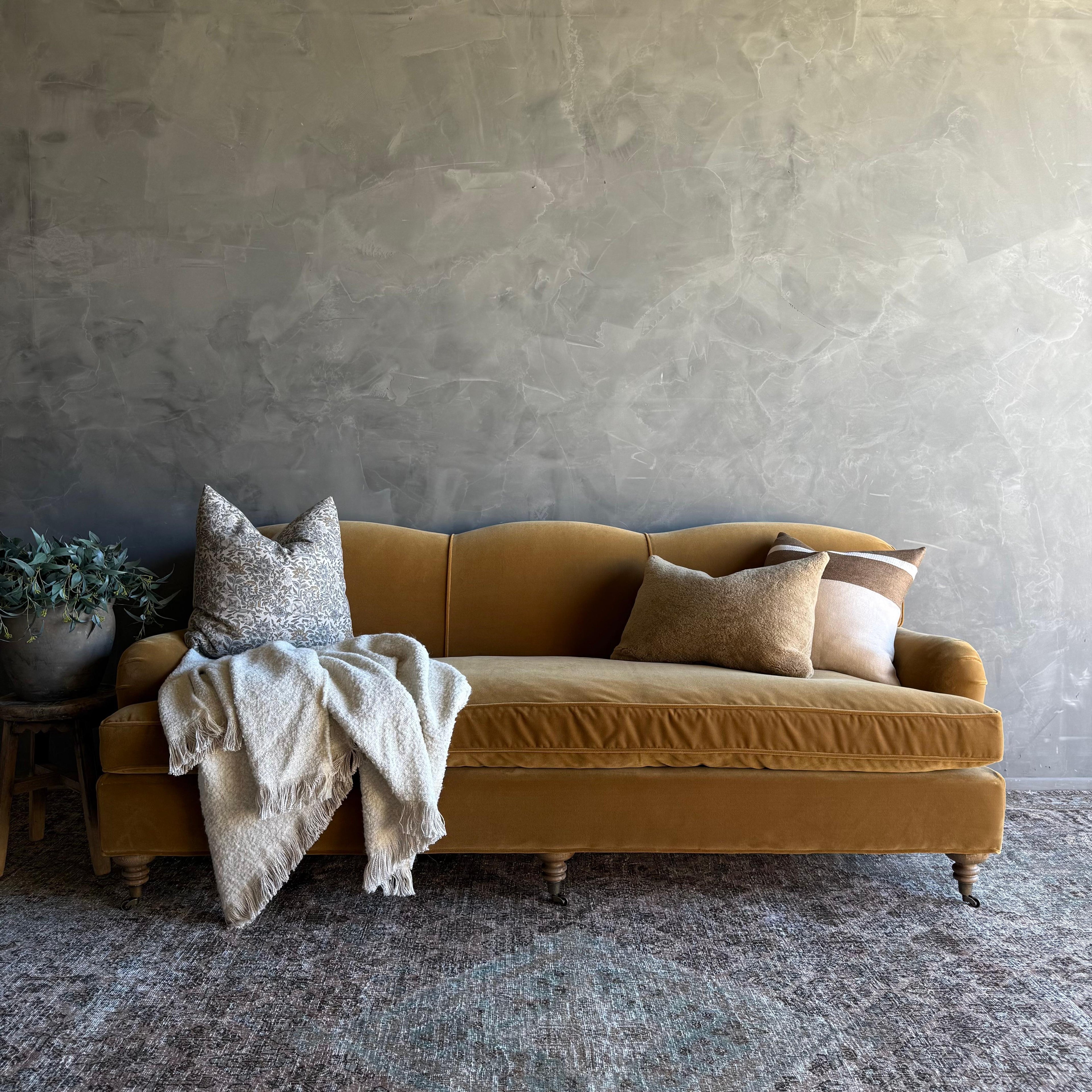 https://a.1stdibscdn.com/modern-english-sofa-in-a-caramel-mustard-faux-velvet-mohair-with-down-cushion-for-sale-picture-14/f_18223/f_478269521764806001064/IMG_2055_2_master.jpg