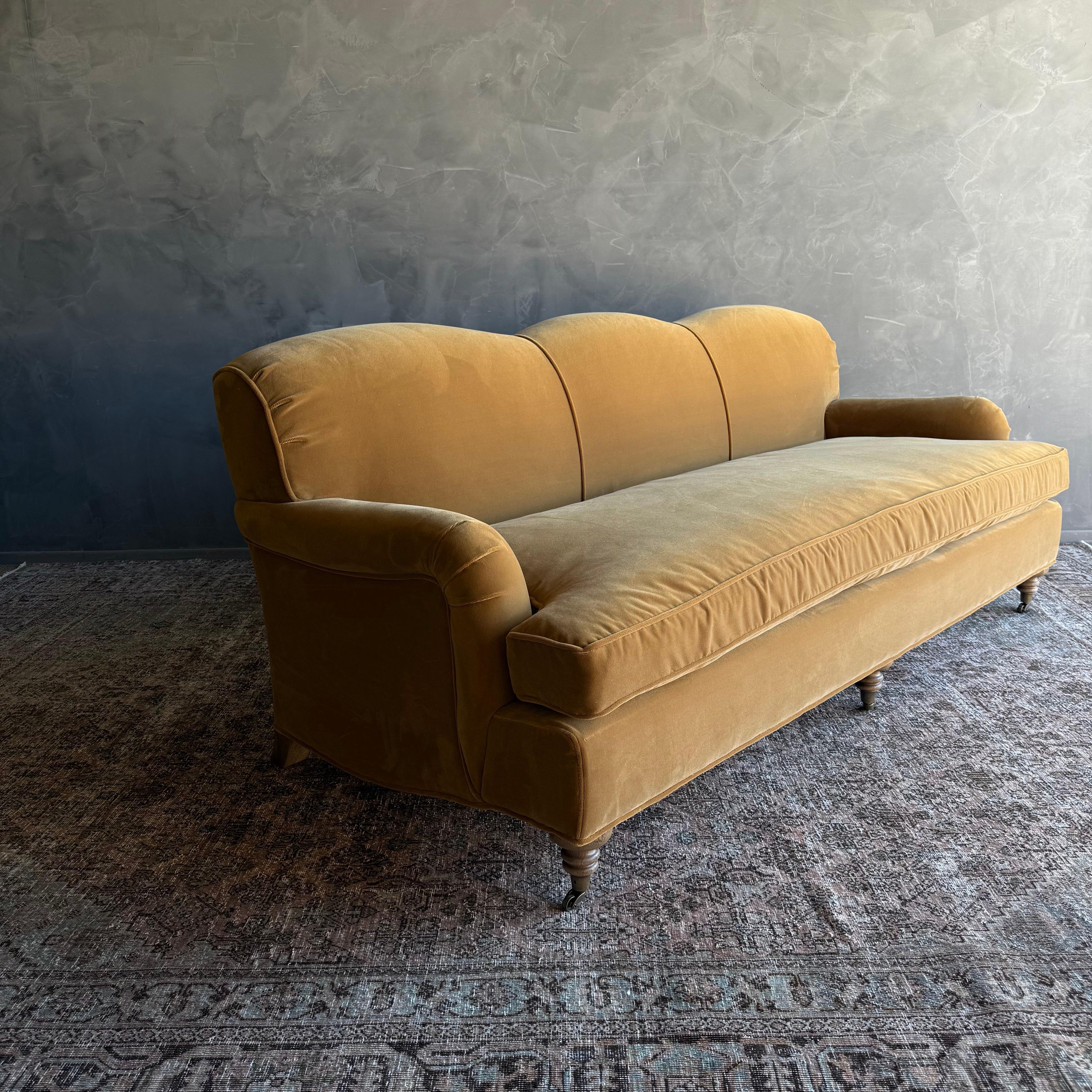 https://a.1stdibscdn.com/modern-english-sofa-in-a-caramel-mustard-faux-velvet-mohair-with-down-cushion-for-sale-picture-9/f_18223/f_478269521764805993662/IMG_2058_master.jpg