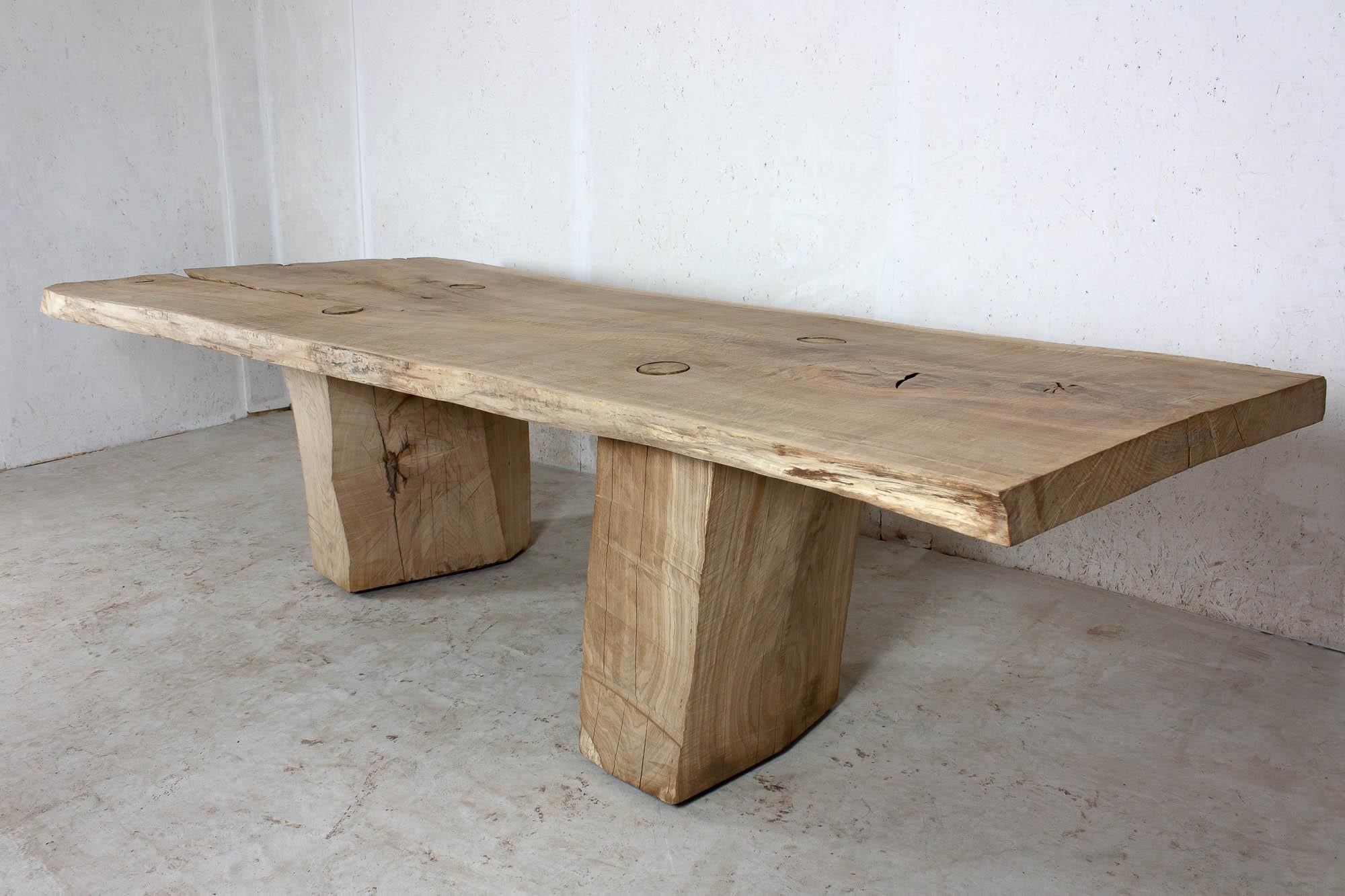 https://a.1stdibscdn.com/sculpted-massive-dining-table-v4-in-solid-oakwood-custom-size-for-sale-picture-5/f_31233/f_234073721618583108520/IMG_2287_master.jpg