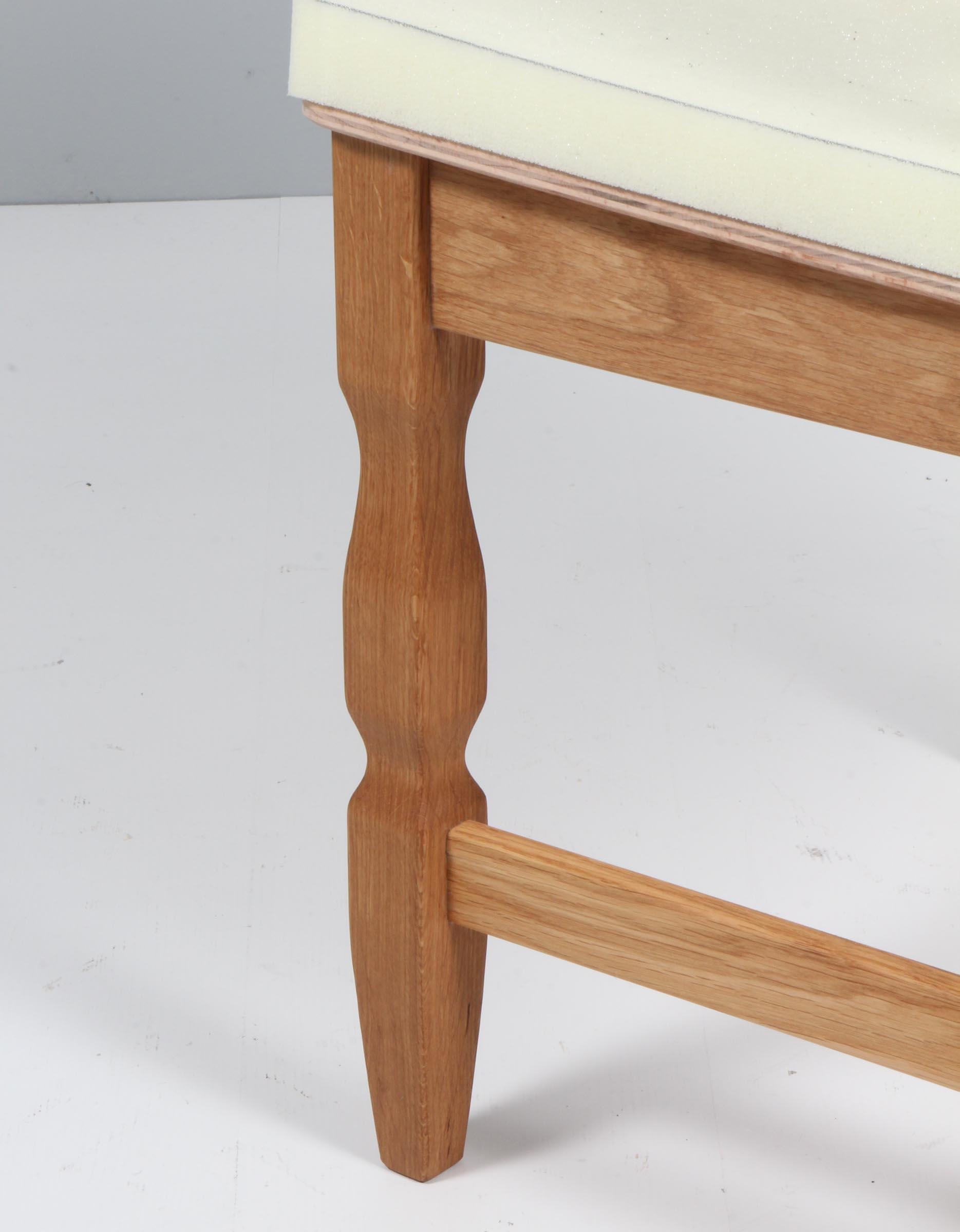 https://a.1stdibscdn.com/dining-chairs-by-henning-kjaernulf-model-razoblade-denmark-oak-for-sale-picture-9/f_42391/f_338321921681631734818/IMG_2460_master.jpg