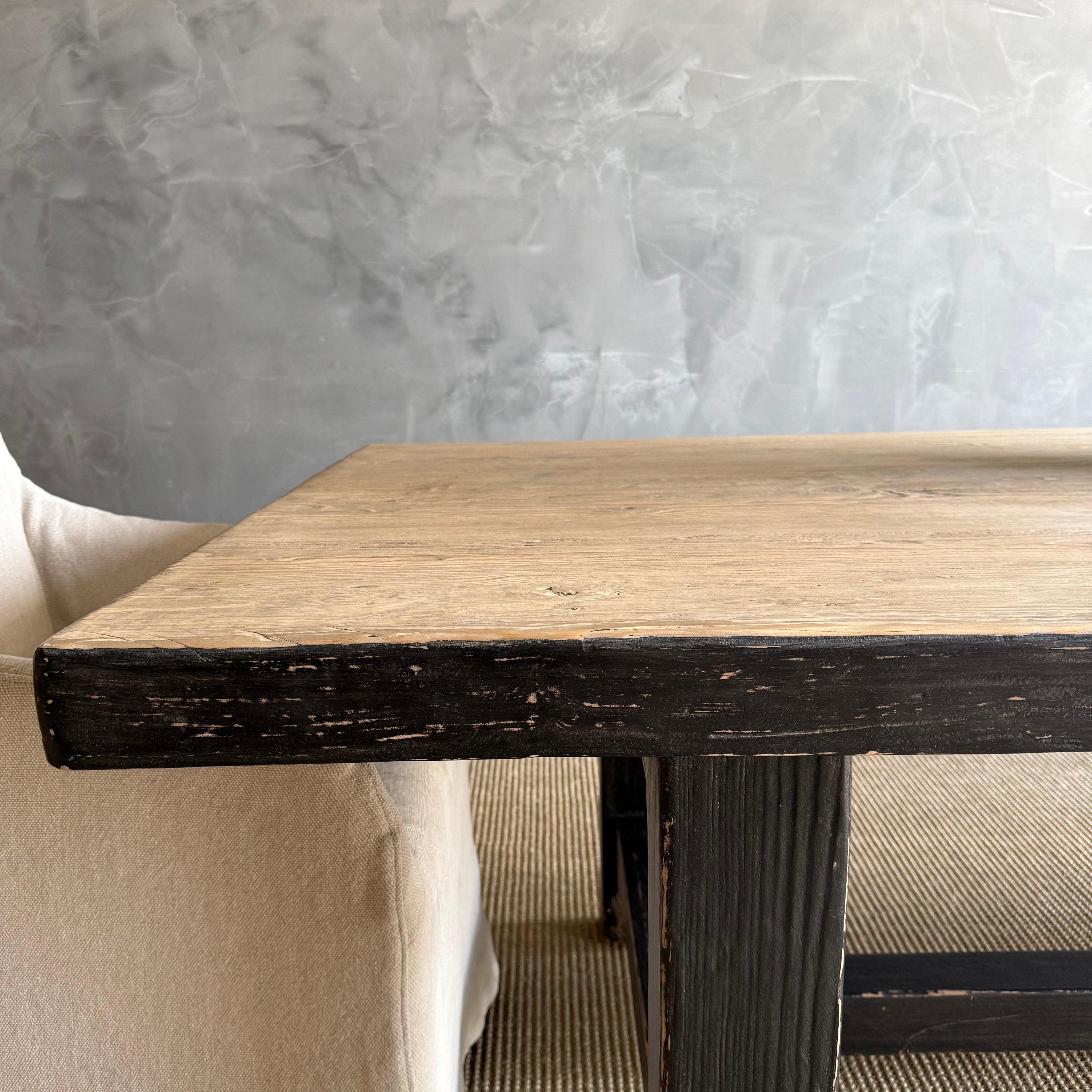 https://a.1stdibscdn.com/reclaimed-elm-wood-dining-table-in-natural-and-black-distress-for-sale-picture-8/f_18223/f_480614221766168598880/IMG_2467_master.jpeg