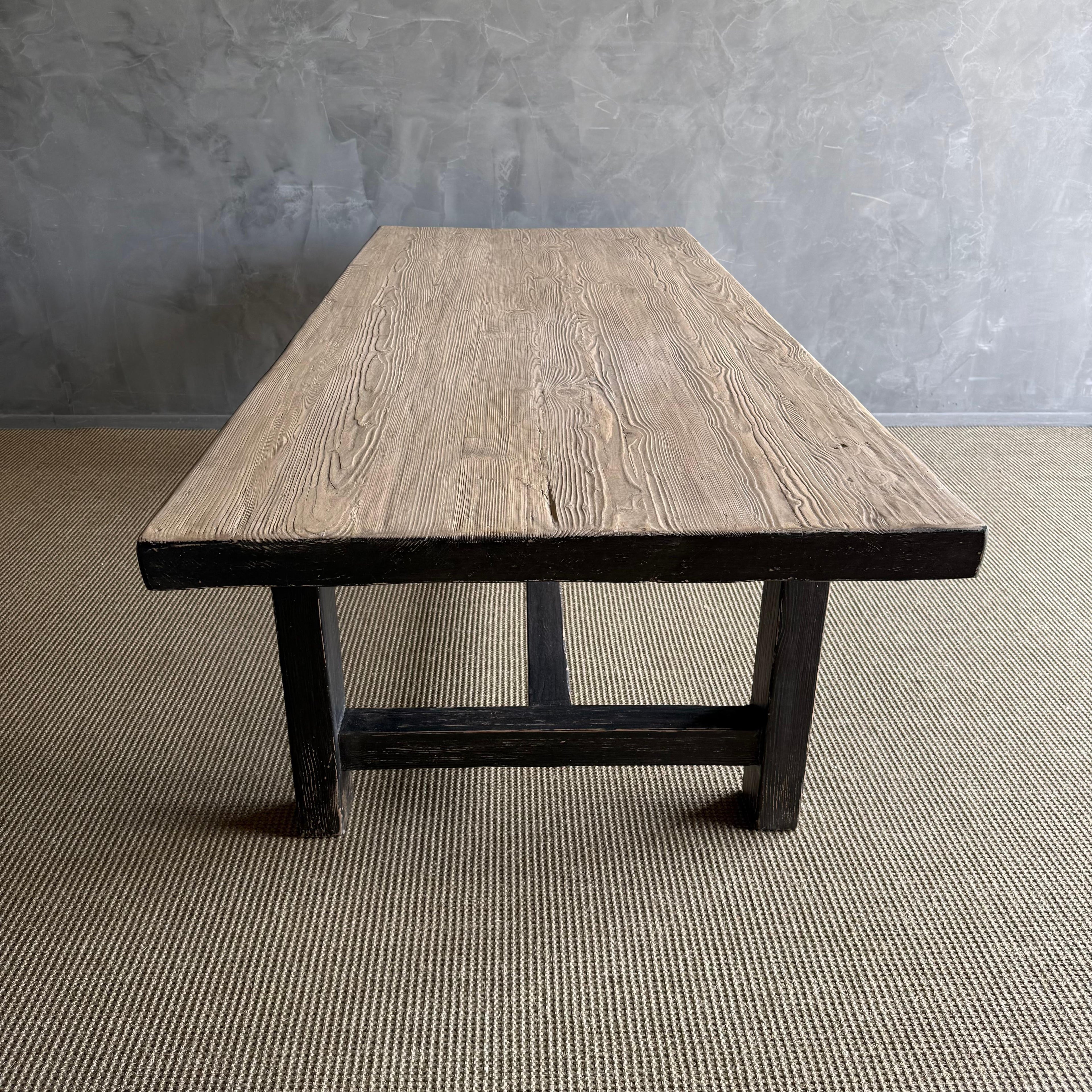 https://a.1stdibscdn.com/reclaimed-elm-wood-dining-table-in-natural-and-black-distress-for-sale-picture-16/f_18223/f_480614221766168609684/IMG_2477_master.jpeg
