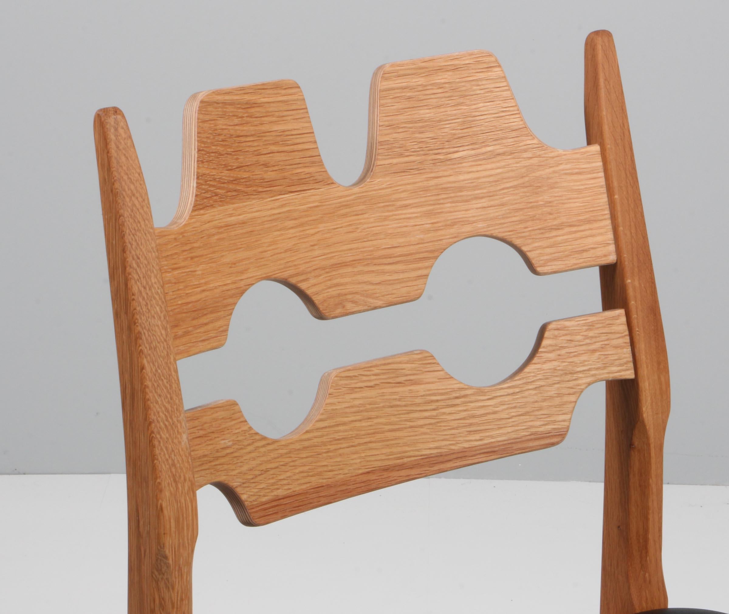 https://a.1stdibscdn.com/dining-chairs-by-henning-kjaernulf-model-razoblade-denmark-oak-for-sale-picture-3/f_42391/f_338324121681632279692/IMG_2480_master.jpg