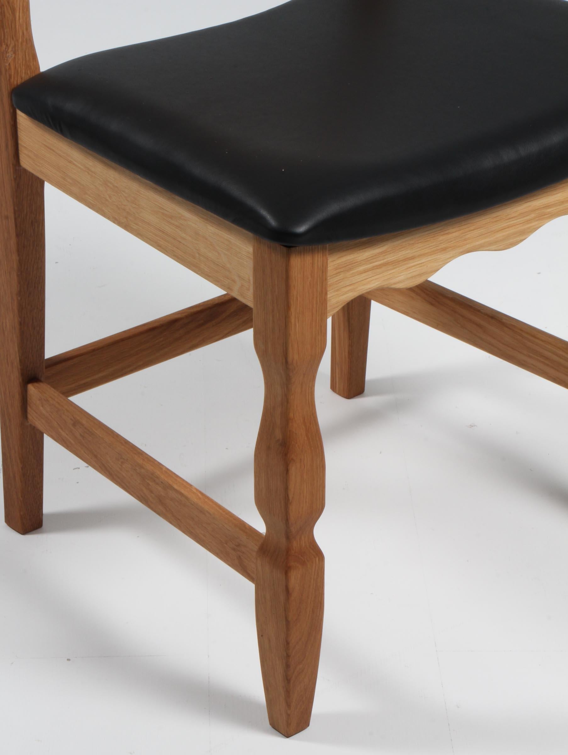 https://a.1stdibscdn.com/dining-chairs-by-henning-kjaernulf-model-razoblade-denmark-oak-for-sale-picture-4/f_42391/f_338324121681632279623/IMG_2482_master.jpg