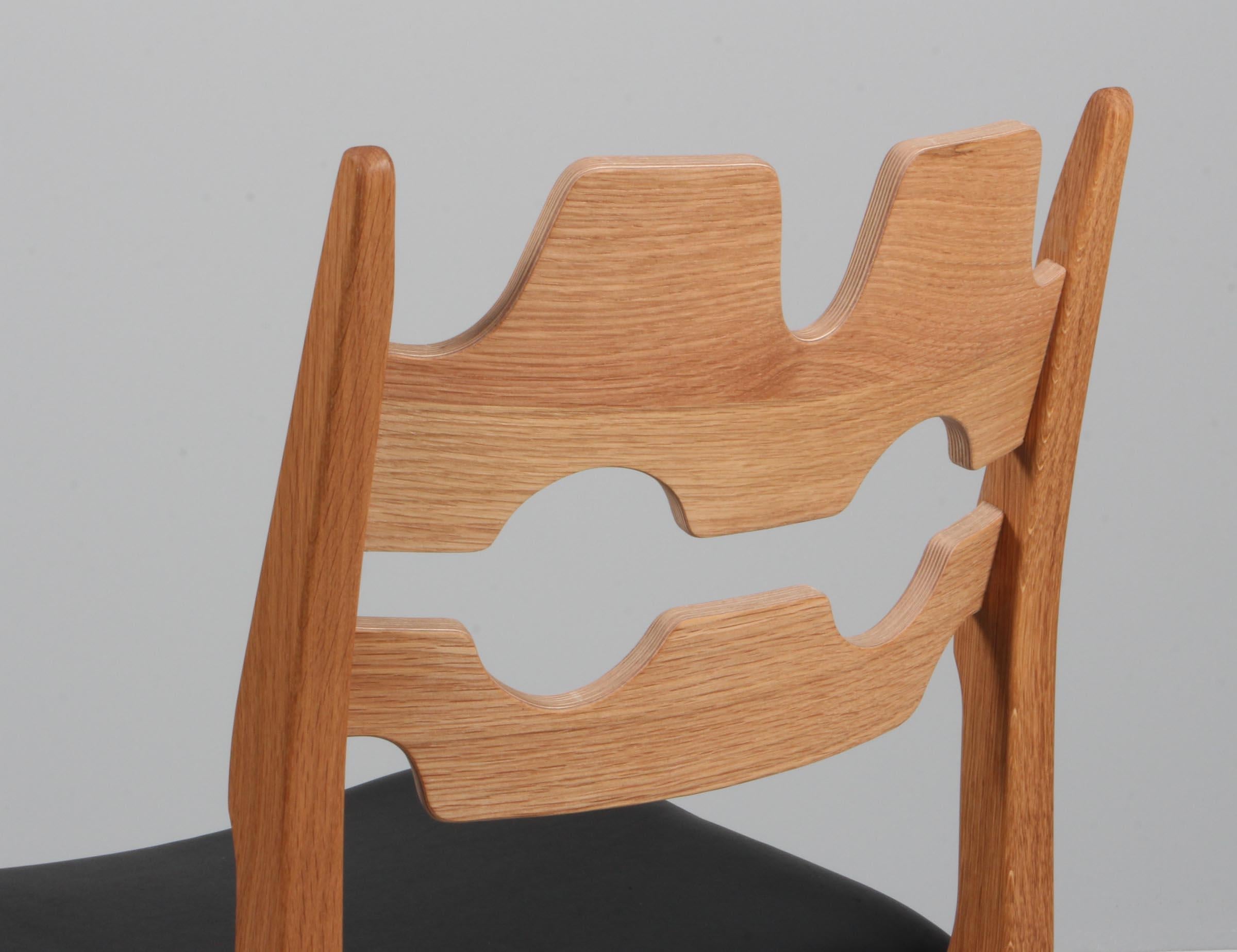 https://a.1stdibscdn.com/dining-chairs-by-henning-kjaernulf-model-razoblade-denmark-oak-for-sale-picture-8/f_42391/f_338324121681632280398/IMG_2486_master.jpg