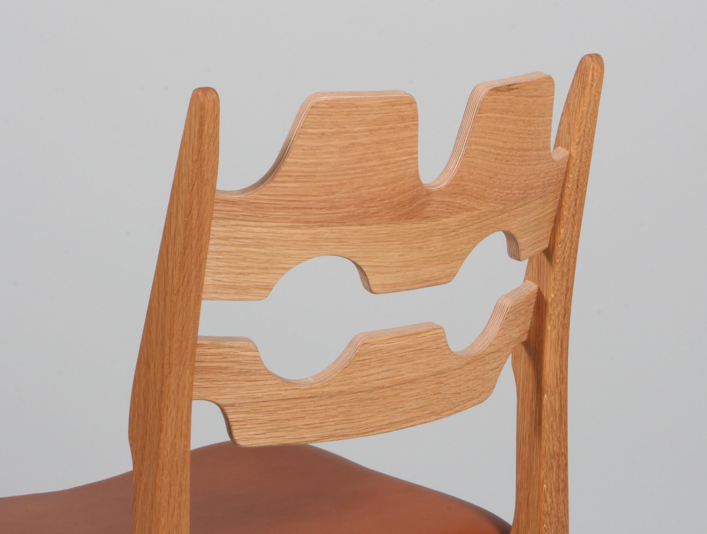 https://a.1stdibscdn.com/dining-chairs-by-henning-kjaernulf-model-razoblade-denmark-oak-for-sale-picture-7/f_42391/f_338324421681632350803/IMG_2495_master.jpg