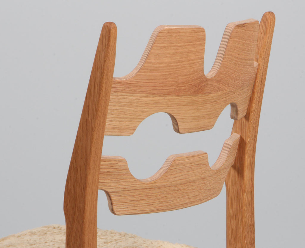 https://a.1stdibscdn.com/dining-chairs-by-henning-kjaernulf-model-razoblade-denmark-oak-for-sale-picture-8/f_42391/f_338324821681632517153/IMG_2511_master.jpg