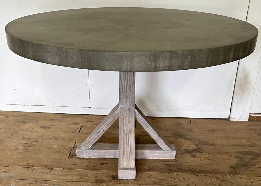 https://a.1stdibscdn.com/round-concrete-farmhouse-pedestal-dining-table-for-sale-picture-2/f_8334/f_360995221694380235513/IMG_2603_master.jpeg