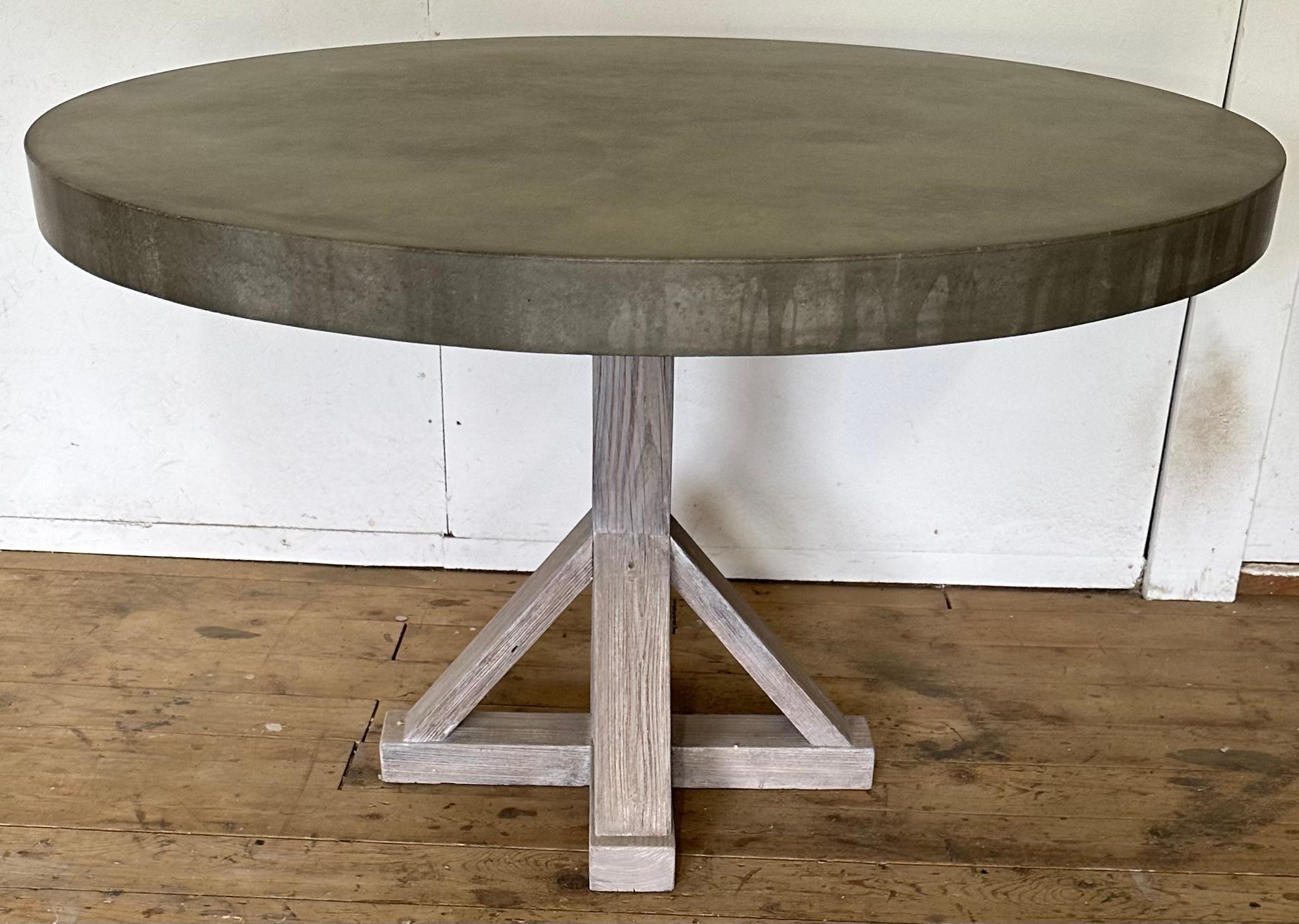 https://a.1stdibscdn.com/round-concrete-farmhouse-pedestal-dining-table-for-sale-picture-2/f_8334/f_360995221694380235513/IMG_2603_master.jpeg