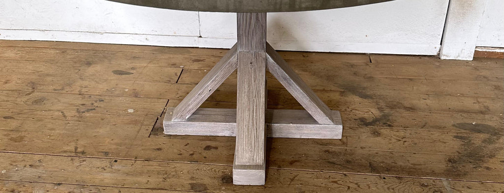 https://a.1stdibscdn.com/round-concrete-farmhouse-pedestal-dining-table-for-sale-picture-5/f_8334/f_360995221694380266129/IMG_2606_master.jpeg
