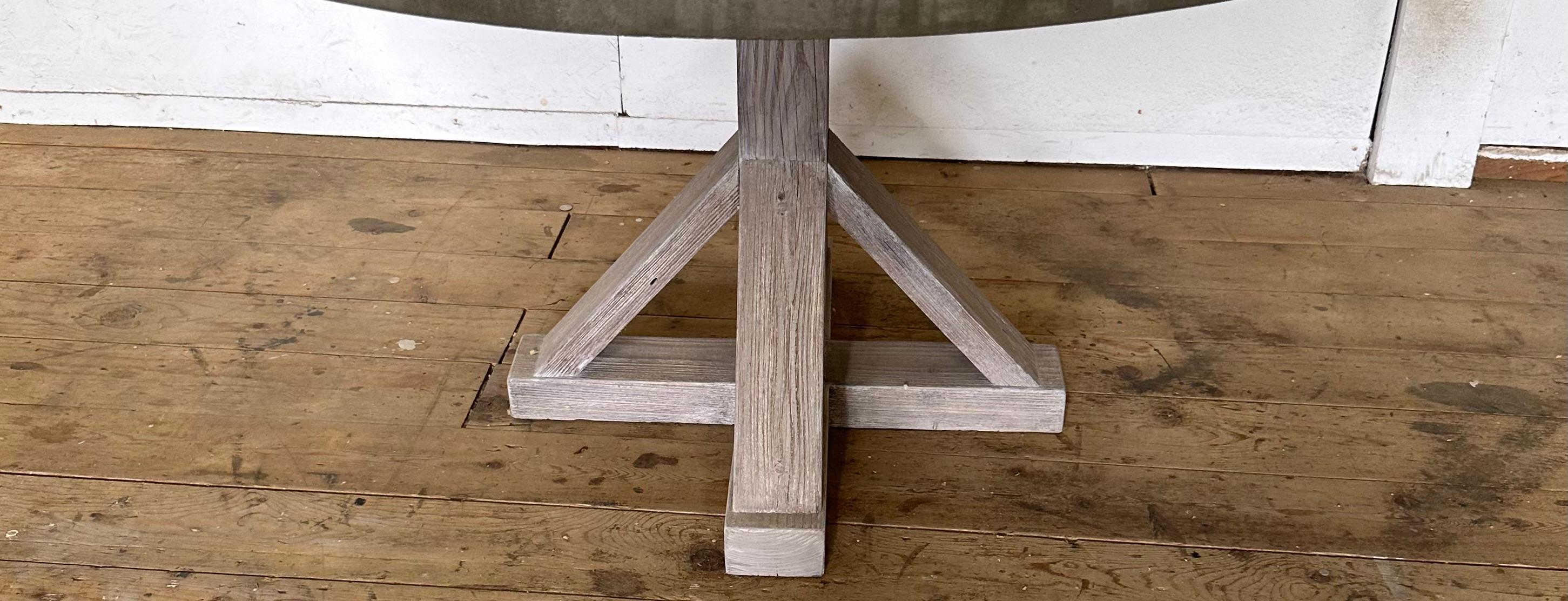 https://a.1stdibscdn.com/round-concrete-farmhouse-pedestal-dining-table-for-sale-picture-5/f_8334/f_360995221694380266129/IMG_2606_master.jpeg