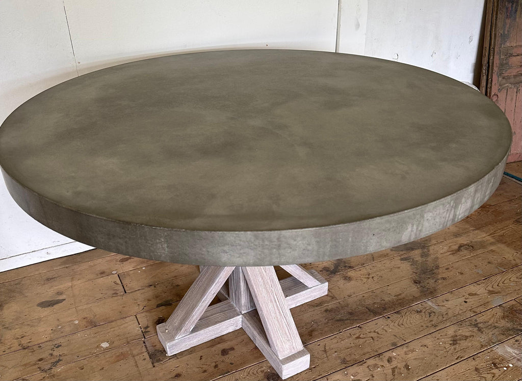 https://a.1stdibscdn.com/round-concrete-farmhouse-pedestal-dining-table-for-sale-picture-4/f_8334/f_360995221694380266184/IMG_2610_master.jpeg