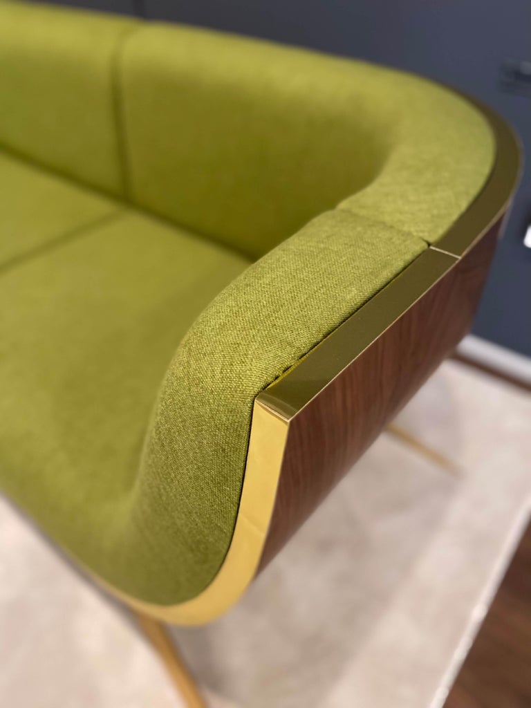 https://a.1stdibscdn.com/21st-century-modern-curved-two-seater-sofa-high-gloss-ironwood-and-gold-finish-for-sale-picture-6/f_61182/f_267549621652883102787/IMG_2755_1_LR_master.jpg?width=768