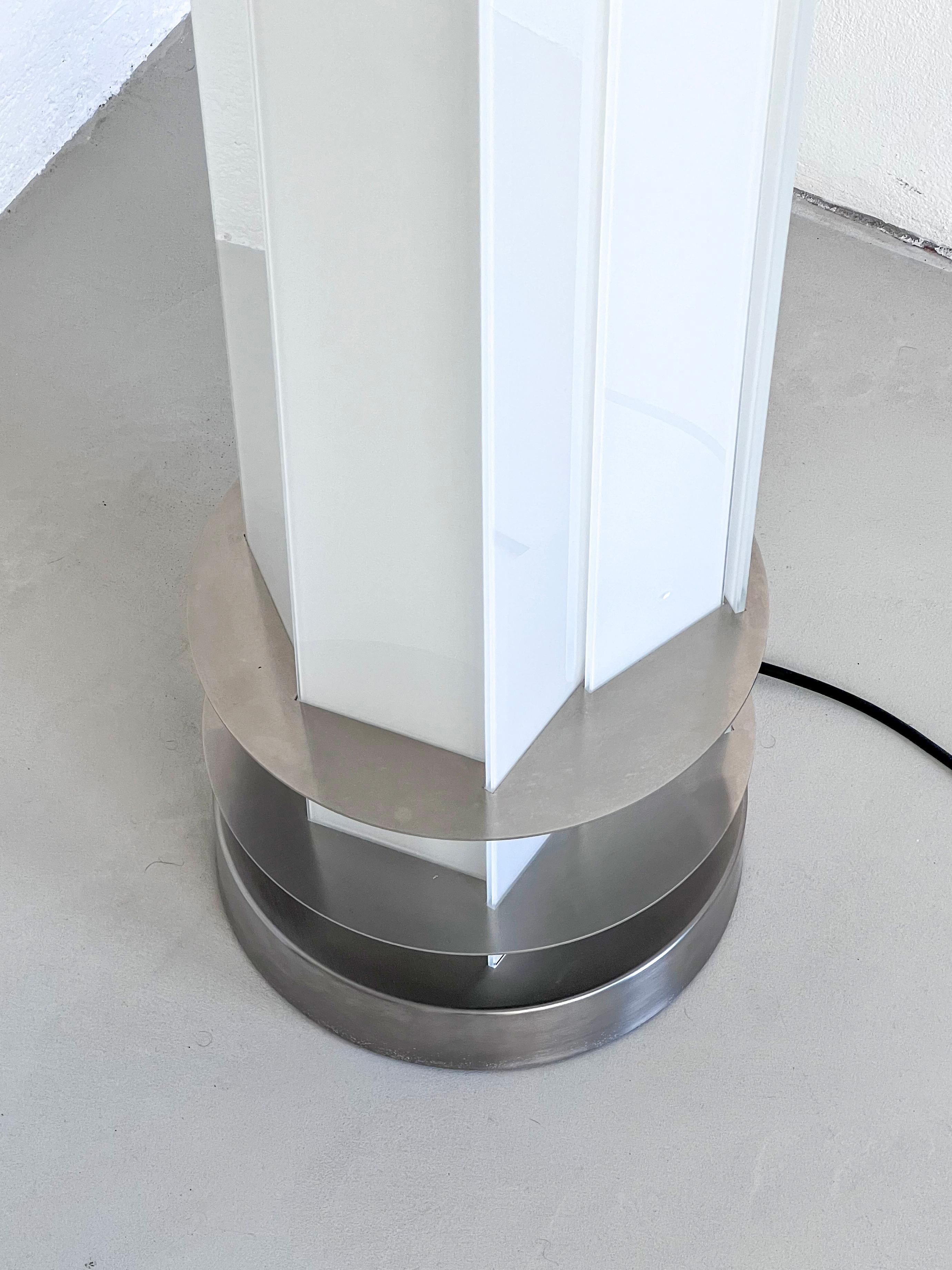 https://a.1stdibscdn.com/fontana-arte-adubai-floor-lamp-steel-and-opaline-glass-blades-matteo-nunziati-for-sale-picture-3/32076752/f_379542921705378283163/IMG_3115_master_master.jpg