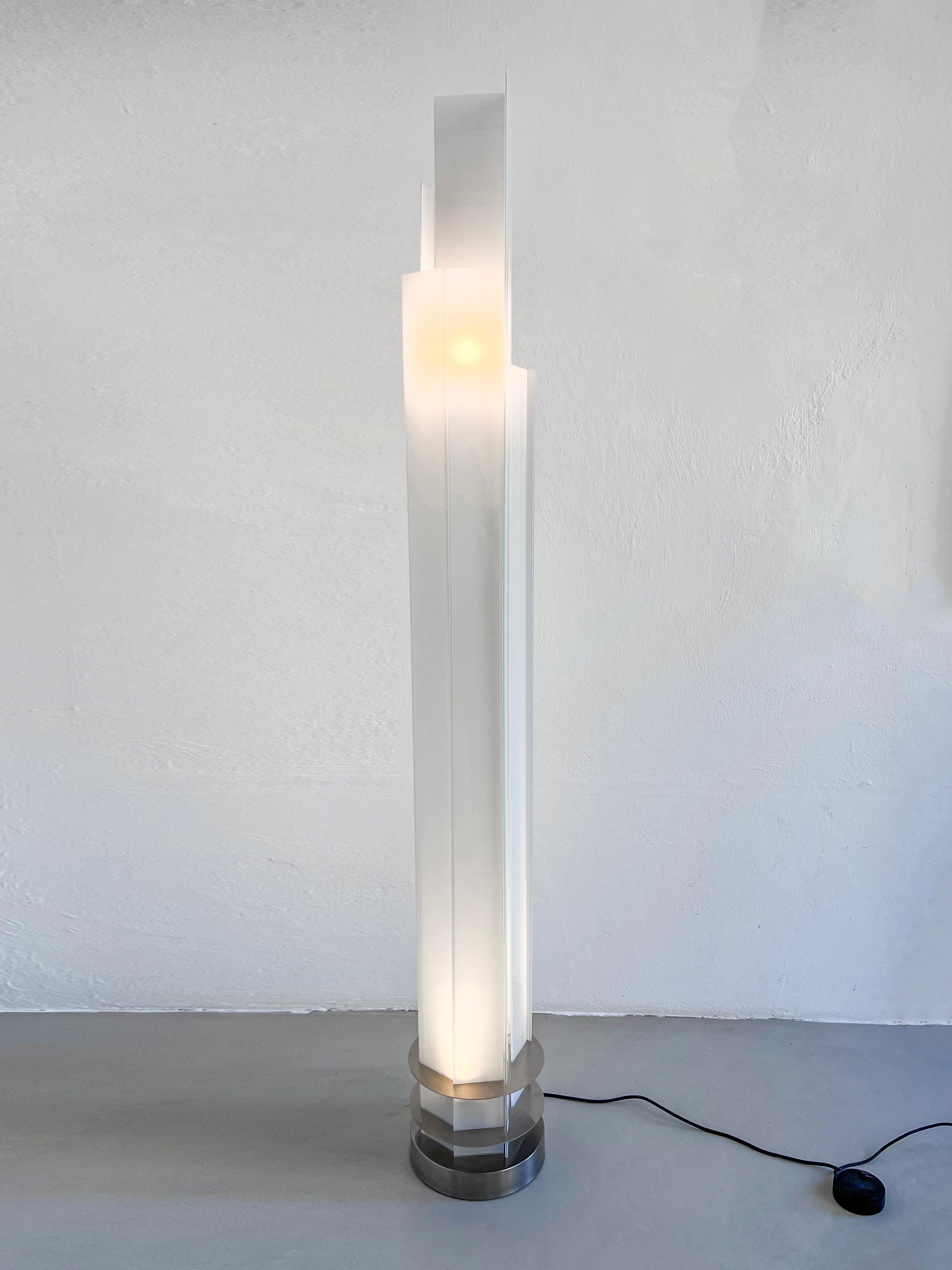 https://a.1stdibscdn.com/fontana-arte-adubai-floor-lamp-steel-and-opaline-glass-blades-matteo-nunziati-for-sale-picture-7/32076752/f_379542921705378282534/IMG_3119_master_master.jpg