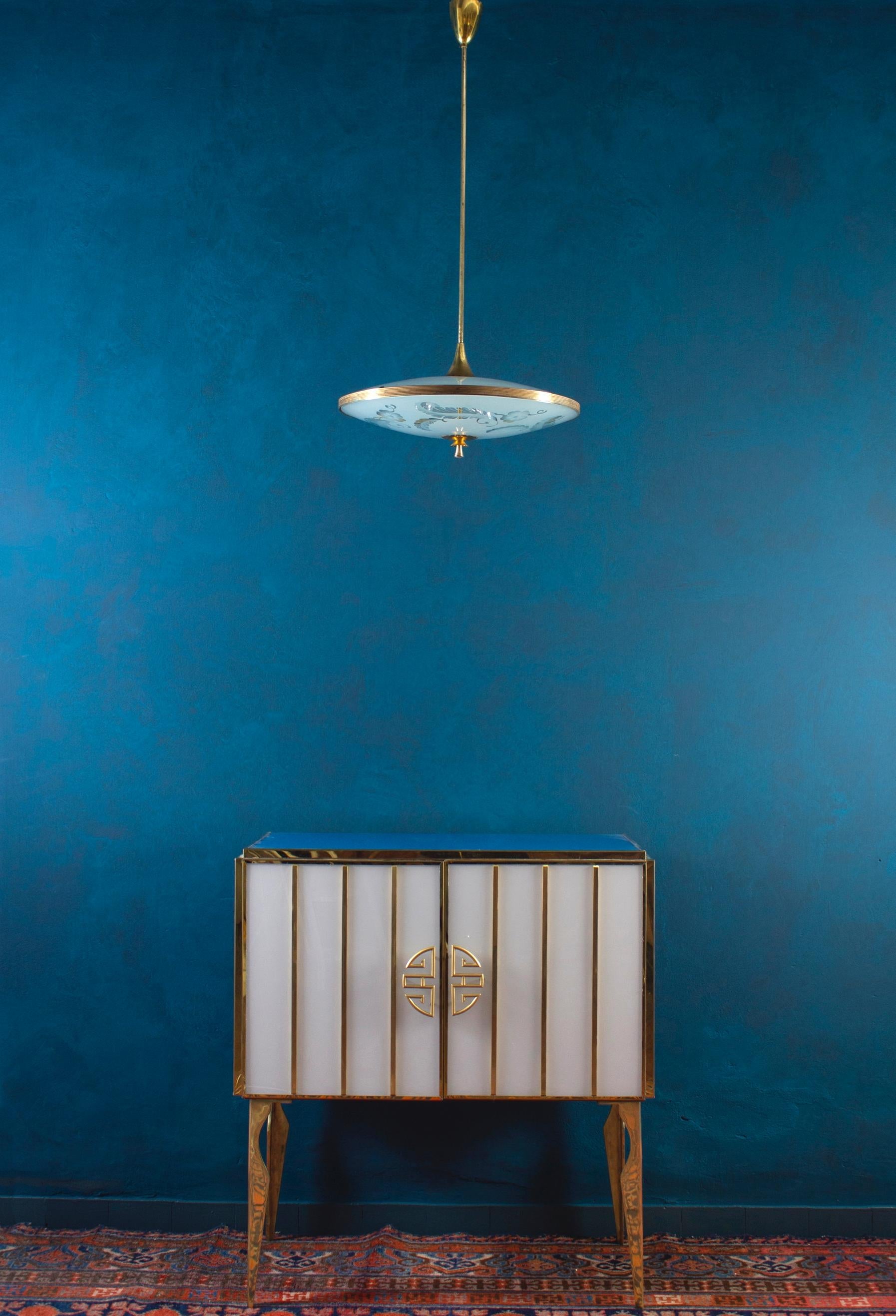 https://a.1stdibscdn.com/midcentury-style-brass-and-colored-murano-glass-bar-cabinet-2020-for-sale-picture-12/f_9859/f_235000421619196452339/IMG_3208_master.jpg