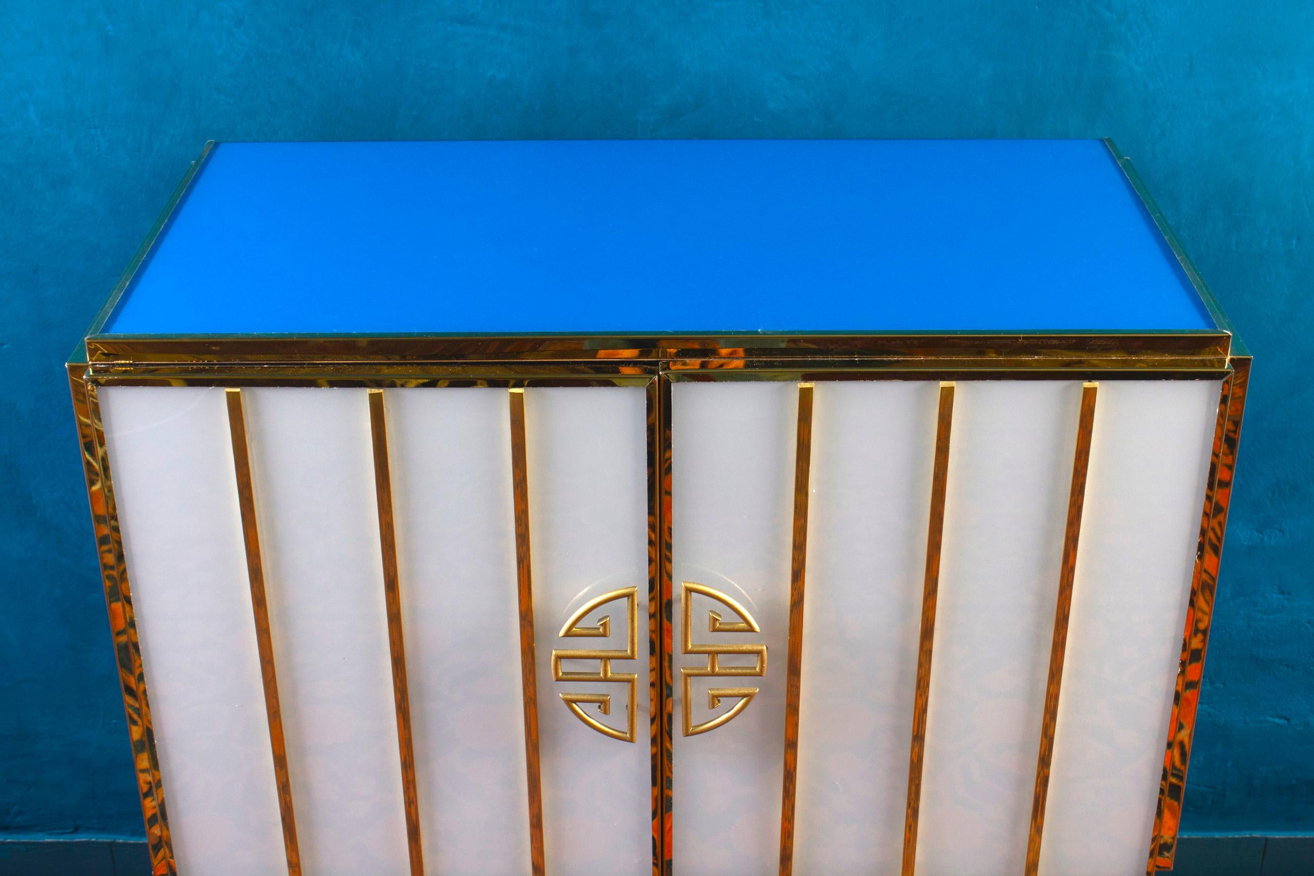 https://a.1stdibscdn.com/midcentury-style-brass-and-colored-murano-glass-bar-cabinet-2020-for-sale-picture-8/f_9859/f_235000421619196468632/IMG_3220_master.jpg
