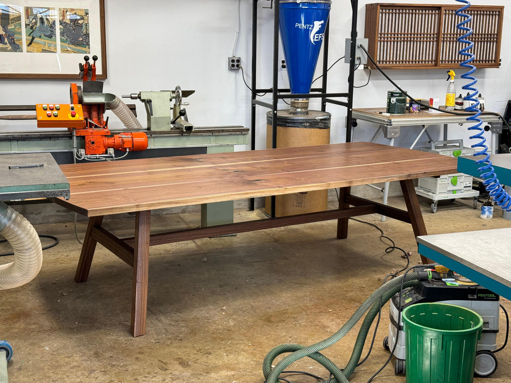 https://a.1stdibscdn.com/splayed-leg-dining-table-in-walnut-for-sale-picture-7/f_45782/f_432046821737147095225/IMG_3448_master.jpeg
