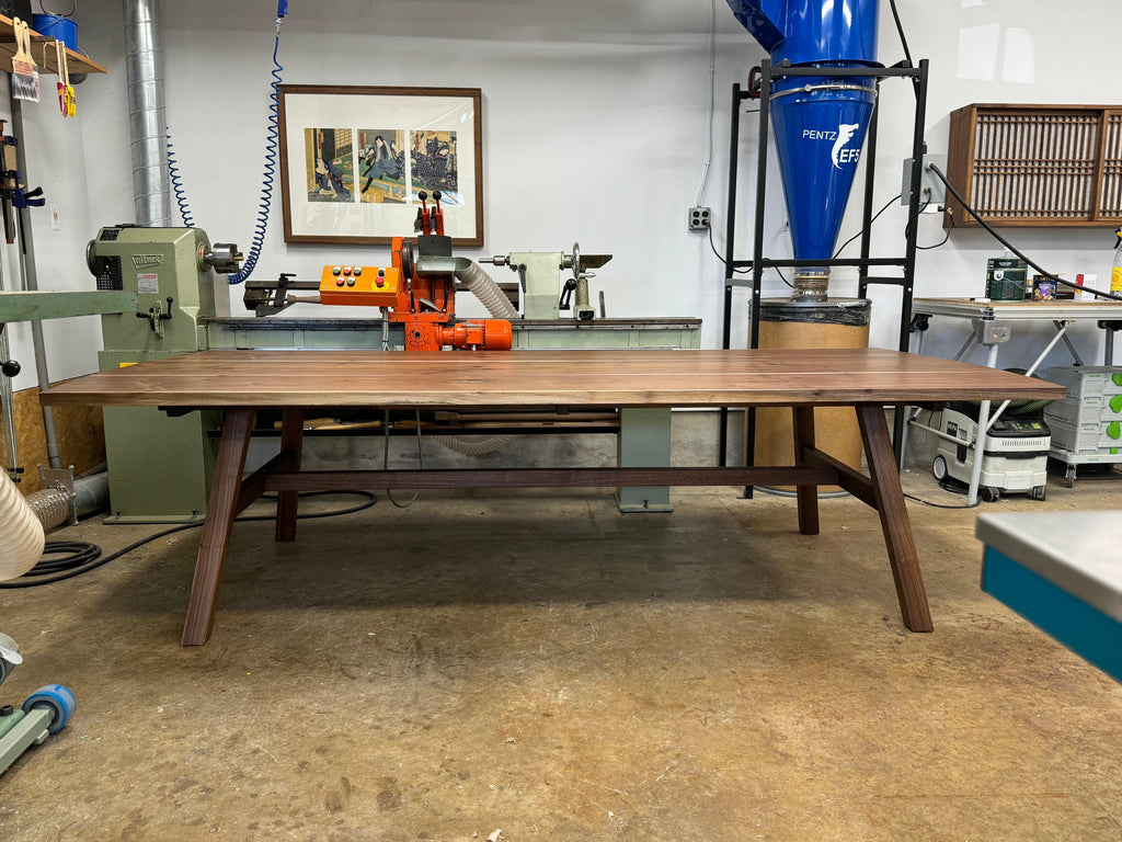 https://a.1stdibscdn.com/splayed-leg-dining-table-in-walnut-for-sale-picture-6/f_45782/f_432046821737147083598/IMG_3454_master.jpeg