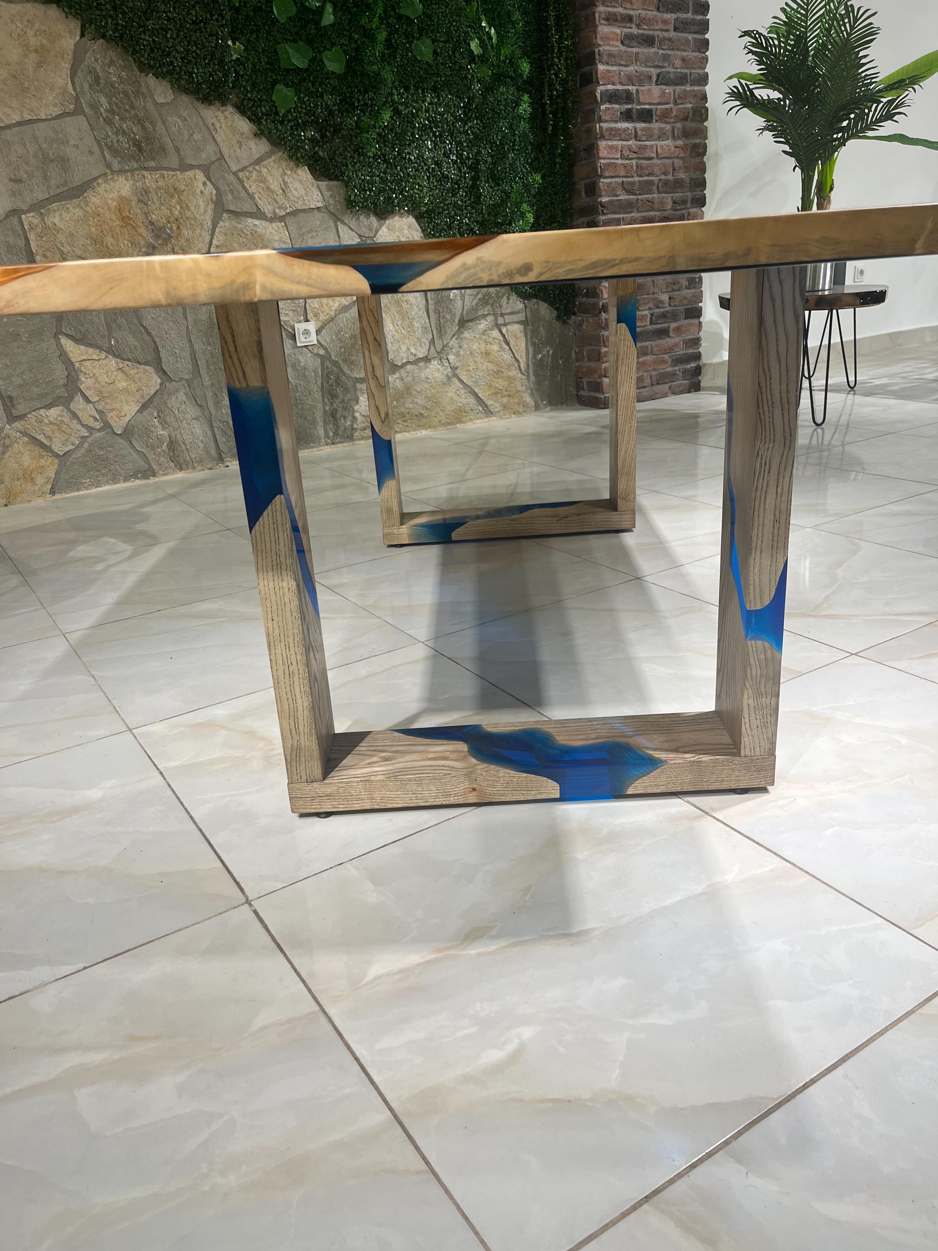 https://a.1stdibscdn.com/blue-river-epoxy-resin-dining-solid-wood-table-for-sale-picture-6/f_91932/f_383360321707493035830/IMG_3840_master.jpg
