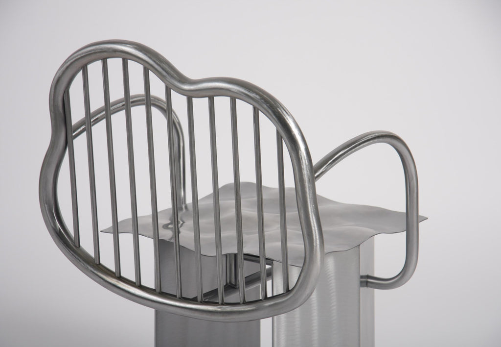 https://a.1stdibscdn.com/shiny-chair-in-stainless-steel-by-supaform-for-sale-picture-12/f_37993/f_182369321583591608685/IMG_3853_S_master.jpg