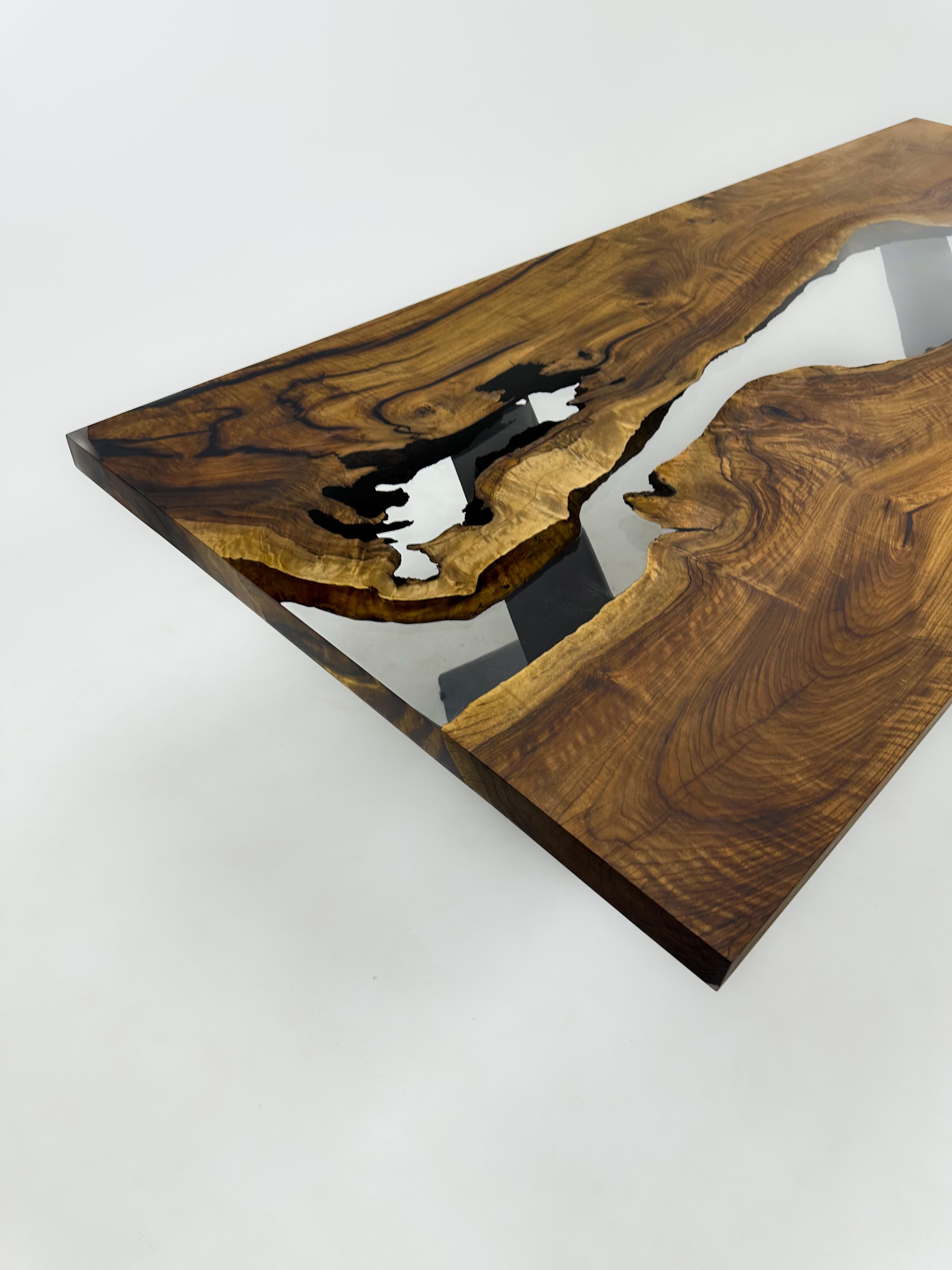 https://a.1stdibscdn.com/modern-clear-epoxy-resin-live-edge-river-walnut-conference-table-for-sale-picture-5/f_91932/f_363149021695648823055/IMG_3866_master.JPG