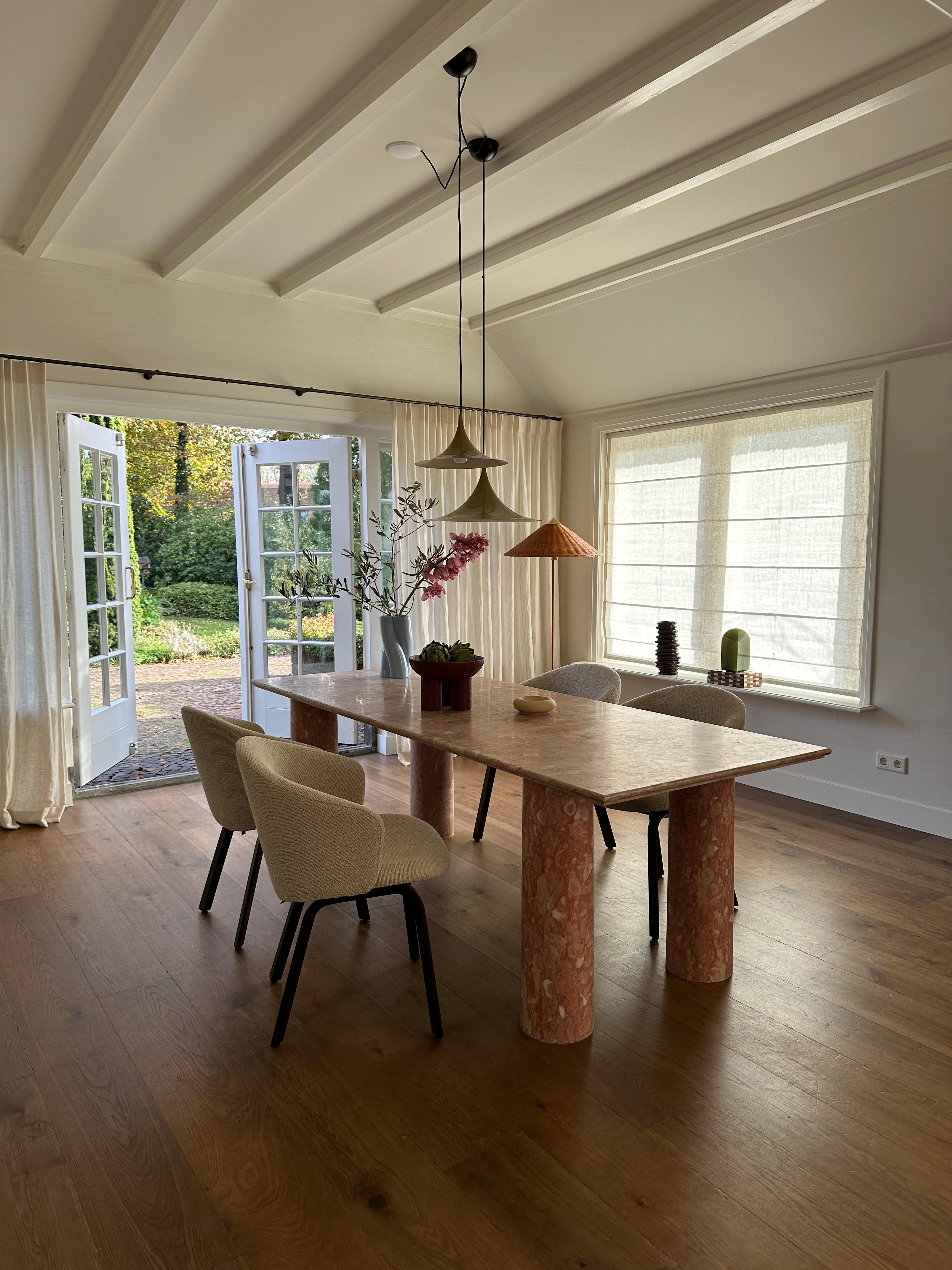 https://a.1stdibscdn.com/large-bellini-style-rectangle-dining-table-in-coral-portuguese-travertine-for-sale-picture-4/f_80522/f_324191021700097474818/IMG_3993_master.jpg