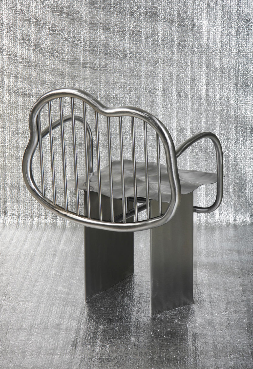 https://a.1stdibscdn.com/shiny-chair-in-stainless-steel-by-supaform-for-sale-picture-5/f_37993/f_182369321583592051050/IMG_4014_S_master.jpg