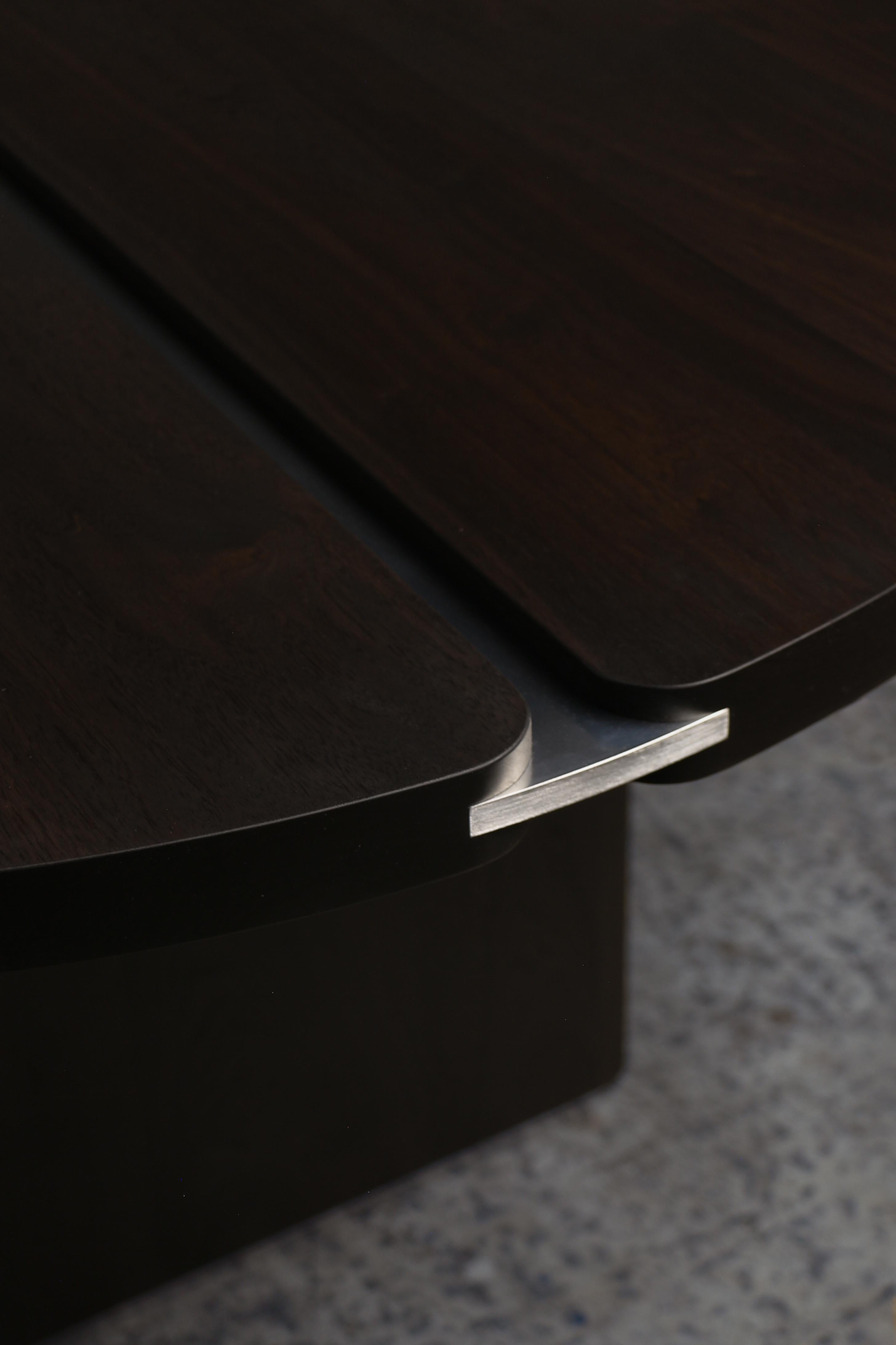https://a.1stdibscdn.com/aurum-dining-table-by-ambrozia-oxidized-walnut-polished-aluminum-10ft-for-sale-picture-2/f_36881/f_435999821739376844554/IMG_4160_master.jpg