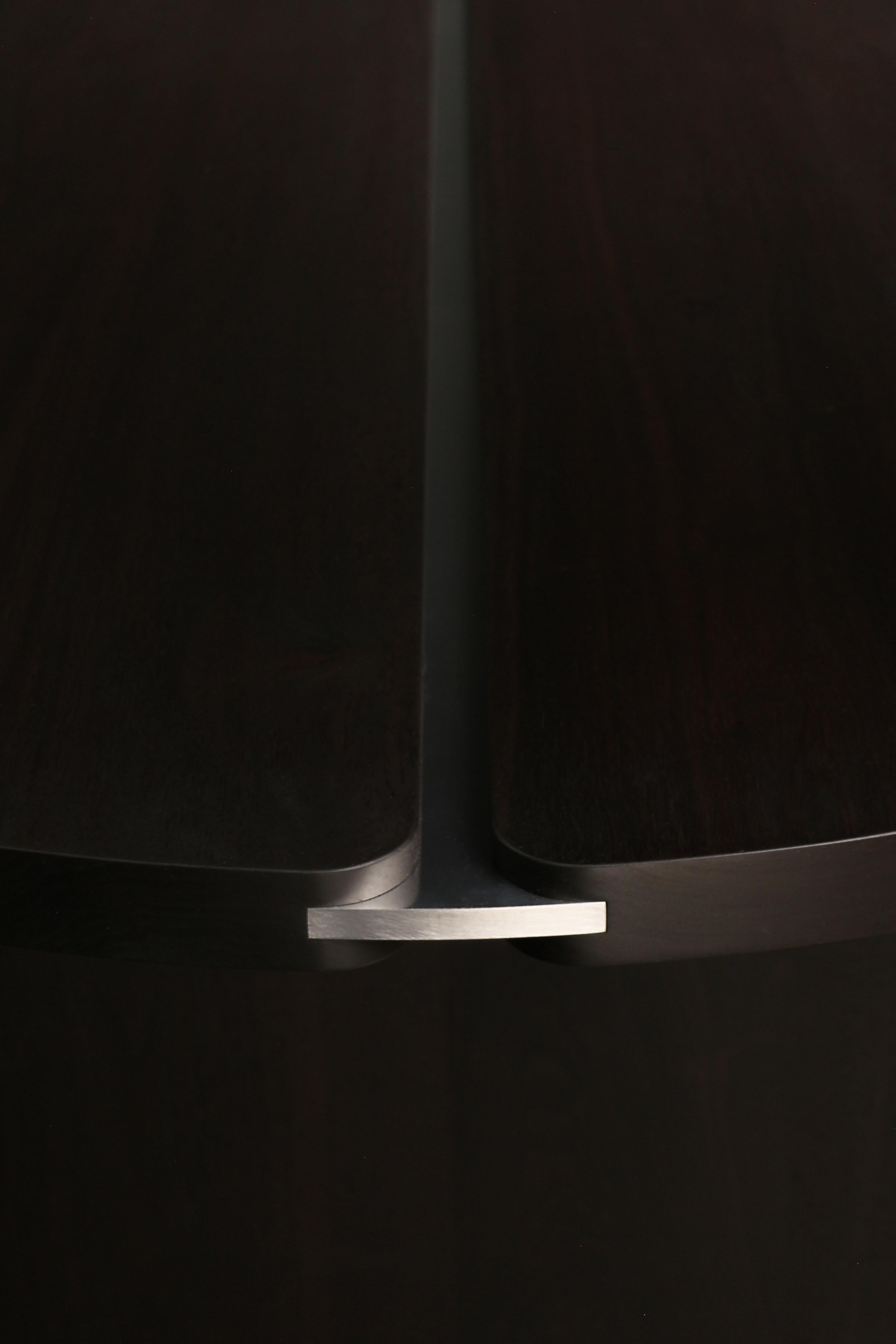 https://a.1stdibscdn.com/aurum-dining-table-by-ambrozia-oxidized-walnut-polished-aluminum-10ft-for-sale-picture-6/f_36881/f_435999821739376844745/IMG_4163_master.jpg