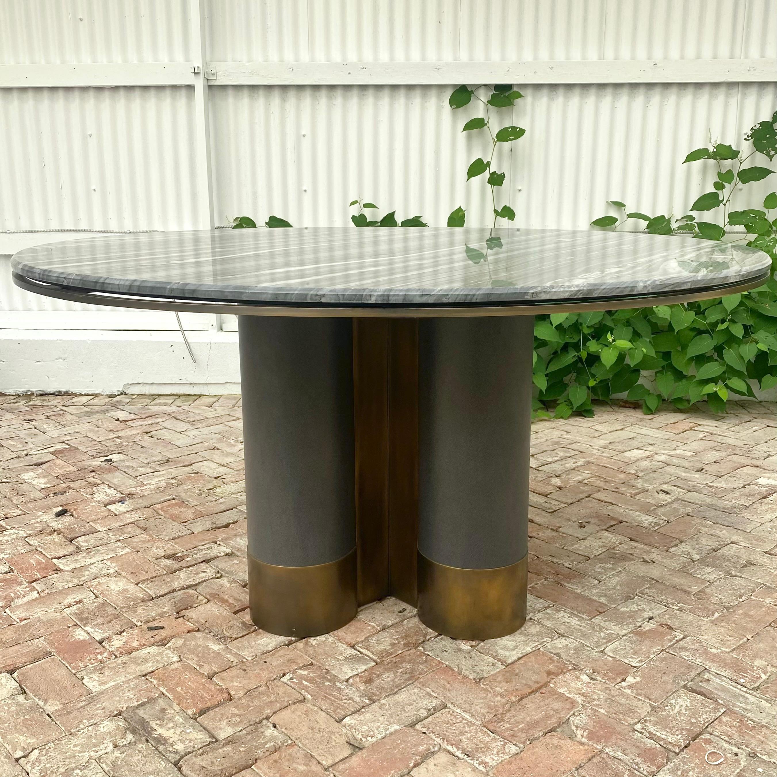 https://a.1stdibscdn.com/custom-made-leather-brass-and-marble-dining-table-2022-los-angeles-for-sale-picture-3/f_18533/f_361093821694445799585/IMG_4208_master.jpeg