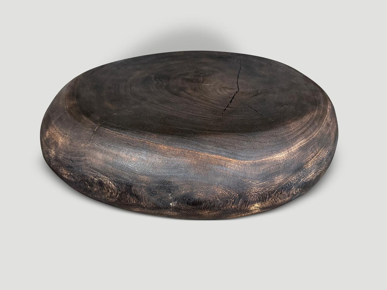 https://a.1stdibscdn.com/andrianna-shamaris-pebble-style-suar-wood-charred-coffee-table-for-sale-picture-2/f_10806/f_460570621753747978187/IMG_4350_master.jpeg