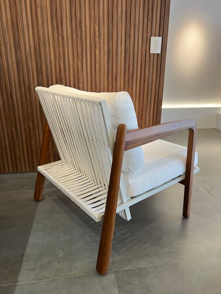 https://a.1stdibscdn.com/sancho-outdoor-armchair-in-natural-teak-wood-aluminum-and-naval-rope-by-hand-for-sale-picture-8/f_56842/f_381119321706635587234/IMG_4351_master.jpg?width=768