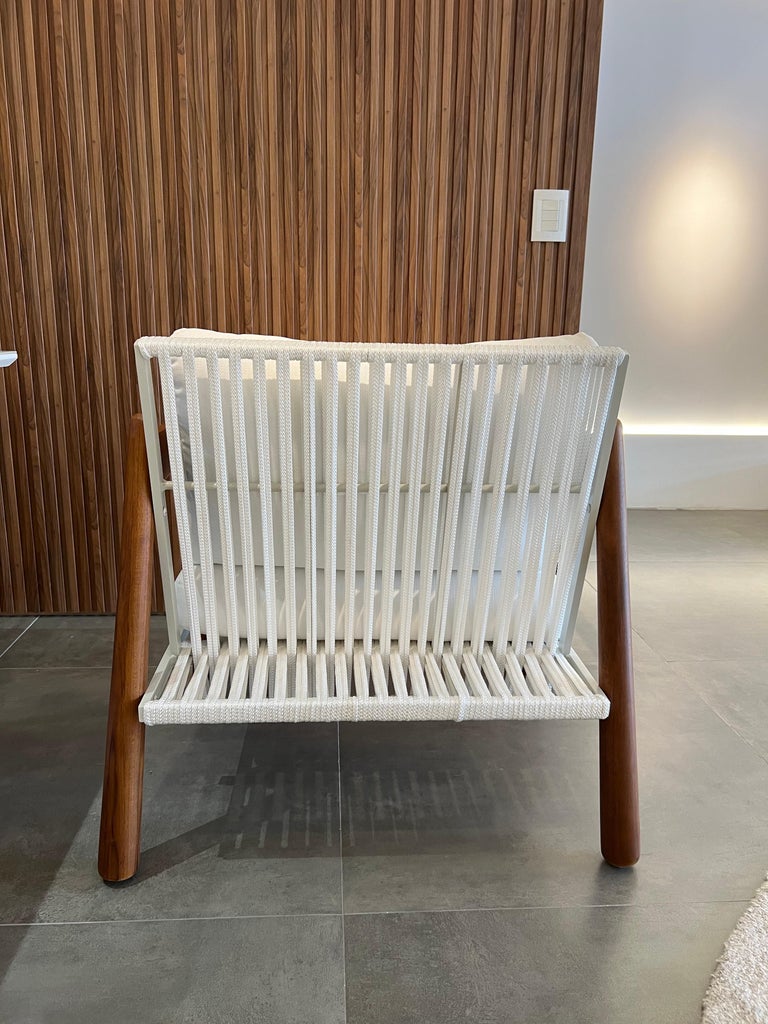 https://a.1stdibscdn.com/sancho-outdoor-armchair-in-natural-teak-wood-aluminum-and-naval-rope-by-hand-for-sale-picture-11/f_56842/f_381119321706635587448/IMG_4354_master.jpg?width=768