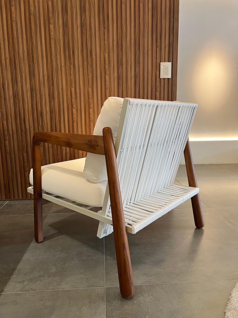 https://a.1stdibscdn.com/sancho-outdoor-armchair-in-natural-teak-wood-aluminum-and-naval-rope-by-hand-for-sale-picture-12/f_56842/f_381119321706635589985/IMG_4355_master.jpg?width=768