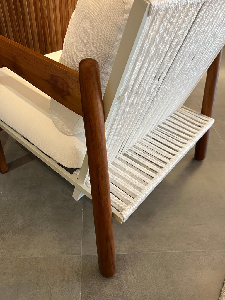 https://a.1stdibscdn.com/sancho-outdoor-armchair-in-natural-teak-wood-aluminum-and-naval-rope-by-hand-for-sale-picture-13/f_56842/f_381119321706635589761/IMG_4356_master.jpg?width=768