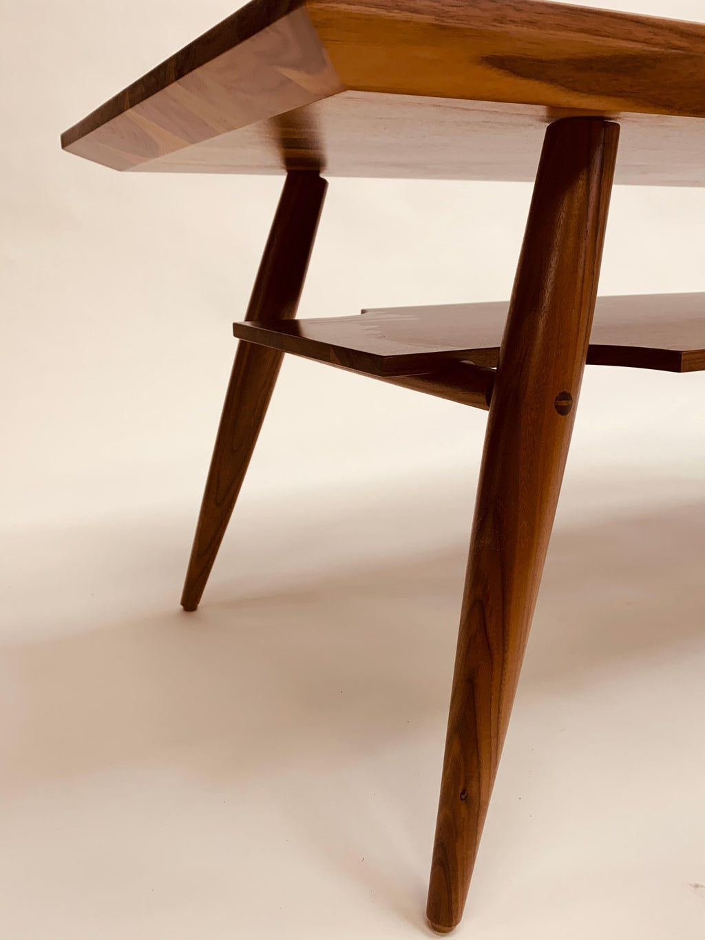 https://a.1stdibscdn.com/mid-century-inspired-coffee-table-with-shelf-in-walnut-for-sale-picture-5/f_99452/f_477372221764279816428/IMG_4834_master.jpg