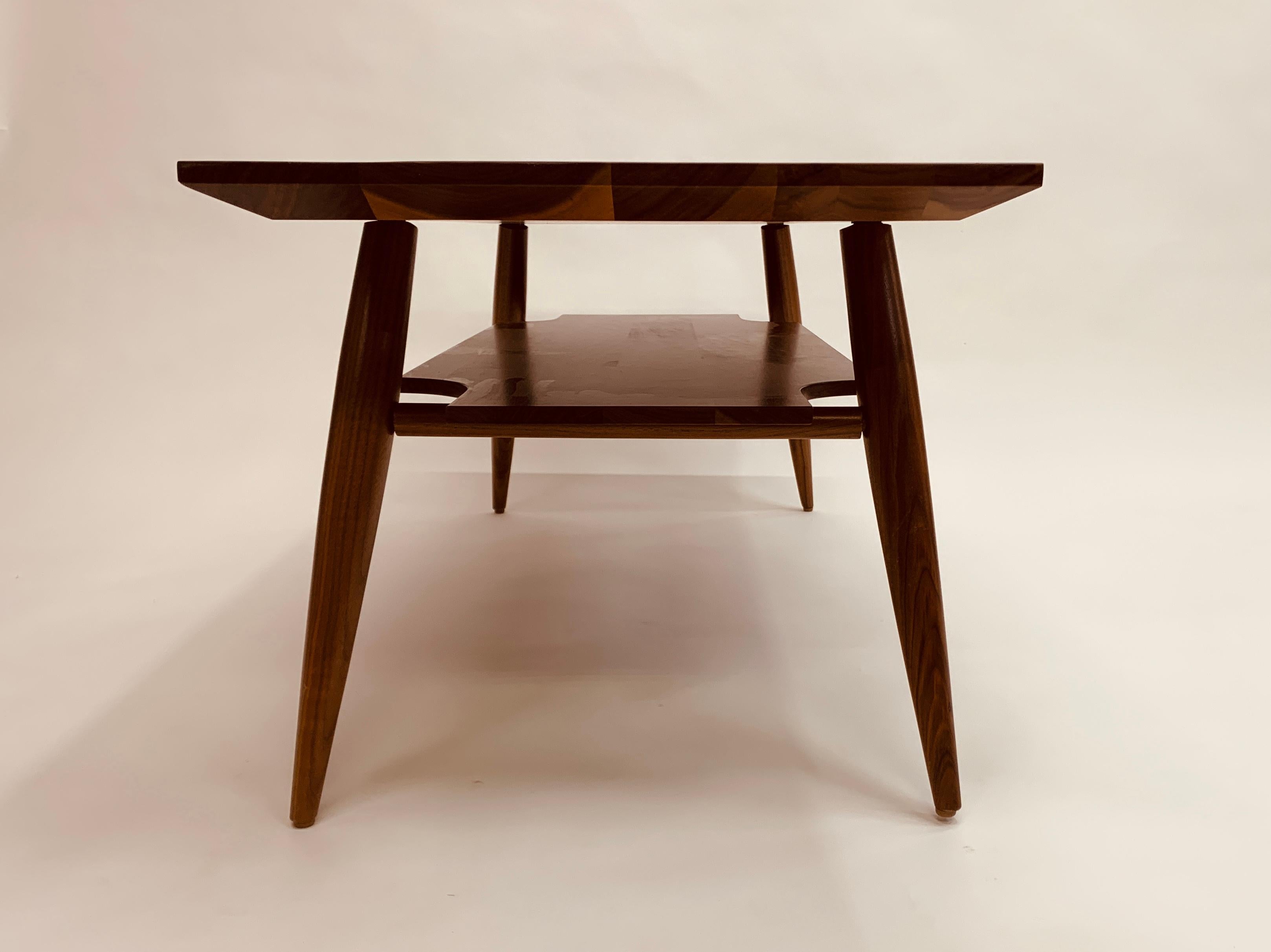 https://a.1stdibscdn.com/mid-century-inspired-coffee-table-with-shelf-in-walnut-for-sale-picture-4/f_99452/f_477372221764279191156/IMG_4840_master.jpg