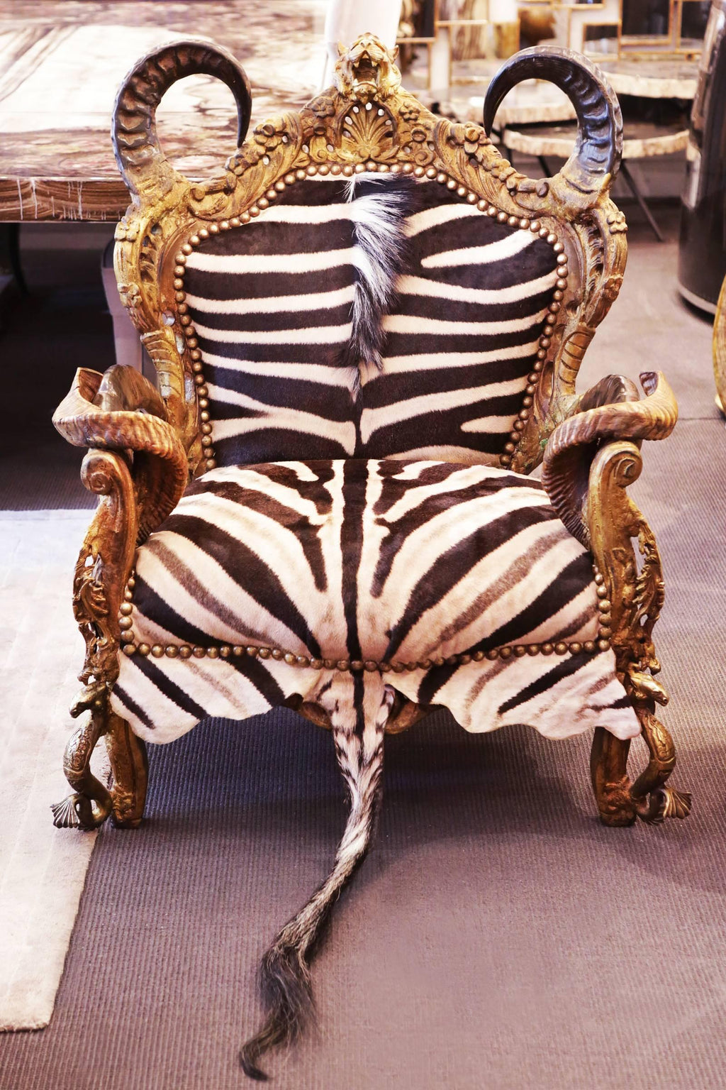 https://a.1stdibscdn.com/zebra-and-lion-head-armchair-for-sale-picture-3/archivesE/upload/f_14282/1524845571692/IMG_4995_master.JPG