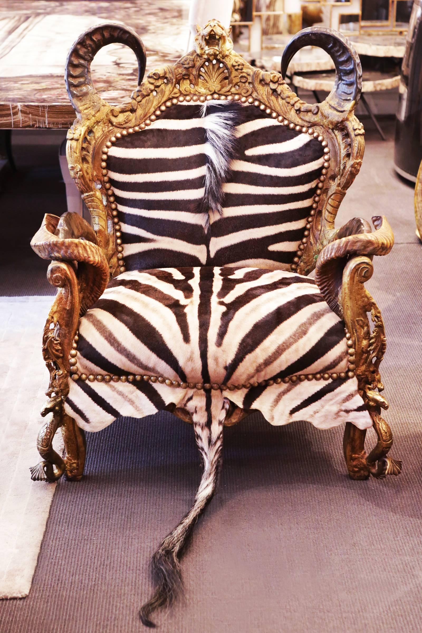 https://a.1stdibscdn.com/zebra-and-lion-head-armchair-for-sale-picture-3/archivesE/upload/f_14282/1524845571692/IMG_4995_master.JPG