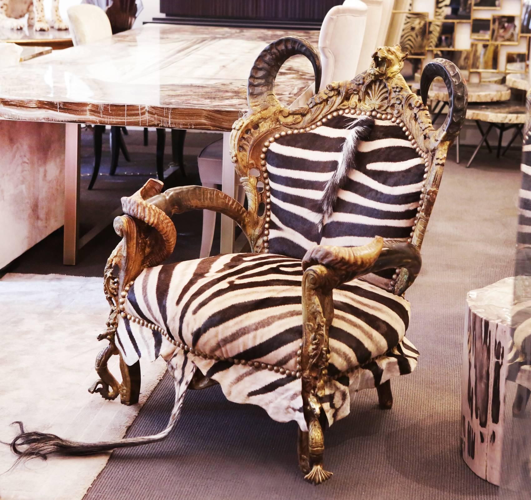 https://a.1stdibscdn.com/zebra-and-lion-head-armchair-for-sale-picture-2/archivesE/upload/f_14282/1524845575634/IMG_4996_master.JPG