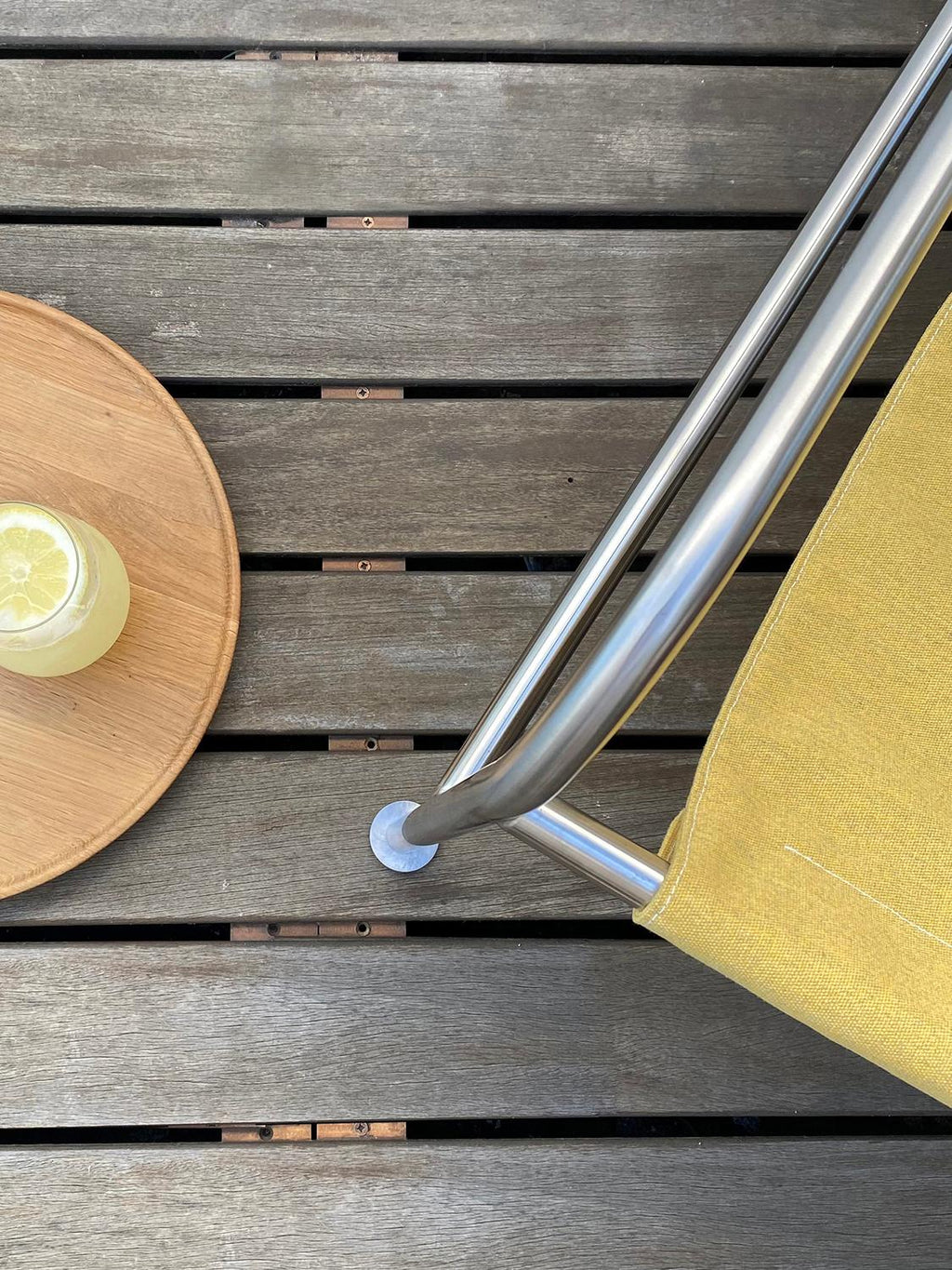 https://a.1stdibscdn.com/minimalist-outdoor-lounge-chair-in-dijon-fabric-and-brushed-stainless-steel-for-sale-picture-5/f_60192/f_286792221652884600466/IMG_5009_REDUZIDA_master.jpg